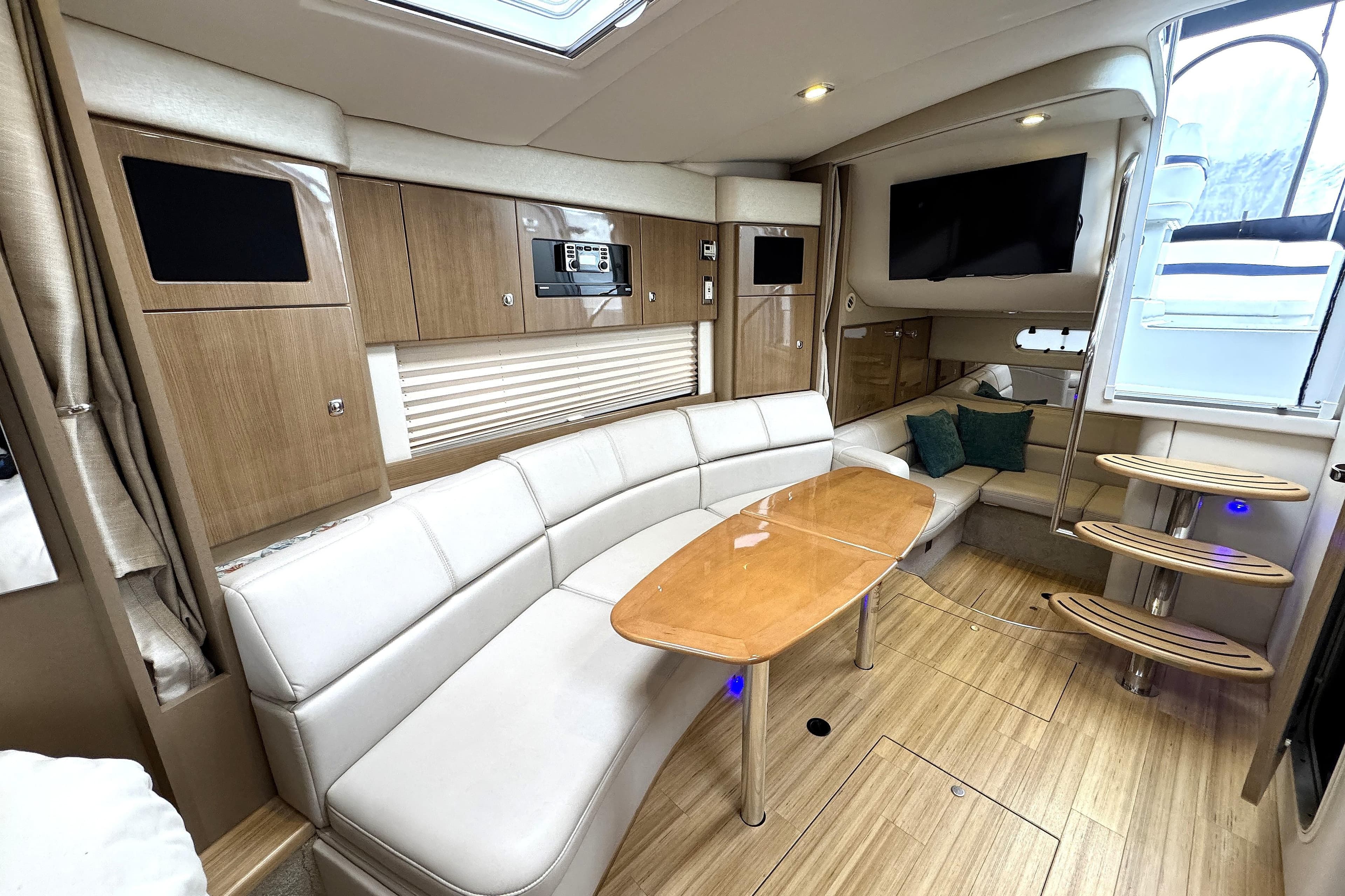 Luxurious interior of 2016 Formula 34 Performance Cruiser with modern seating and wooden finishes.