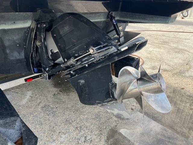 2019 Regal 26 Express boat propeller and stern drive close-up.