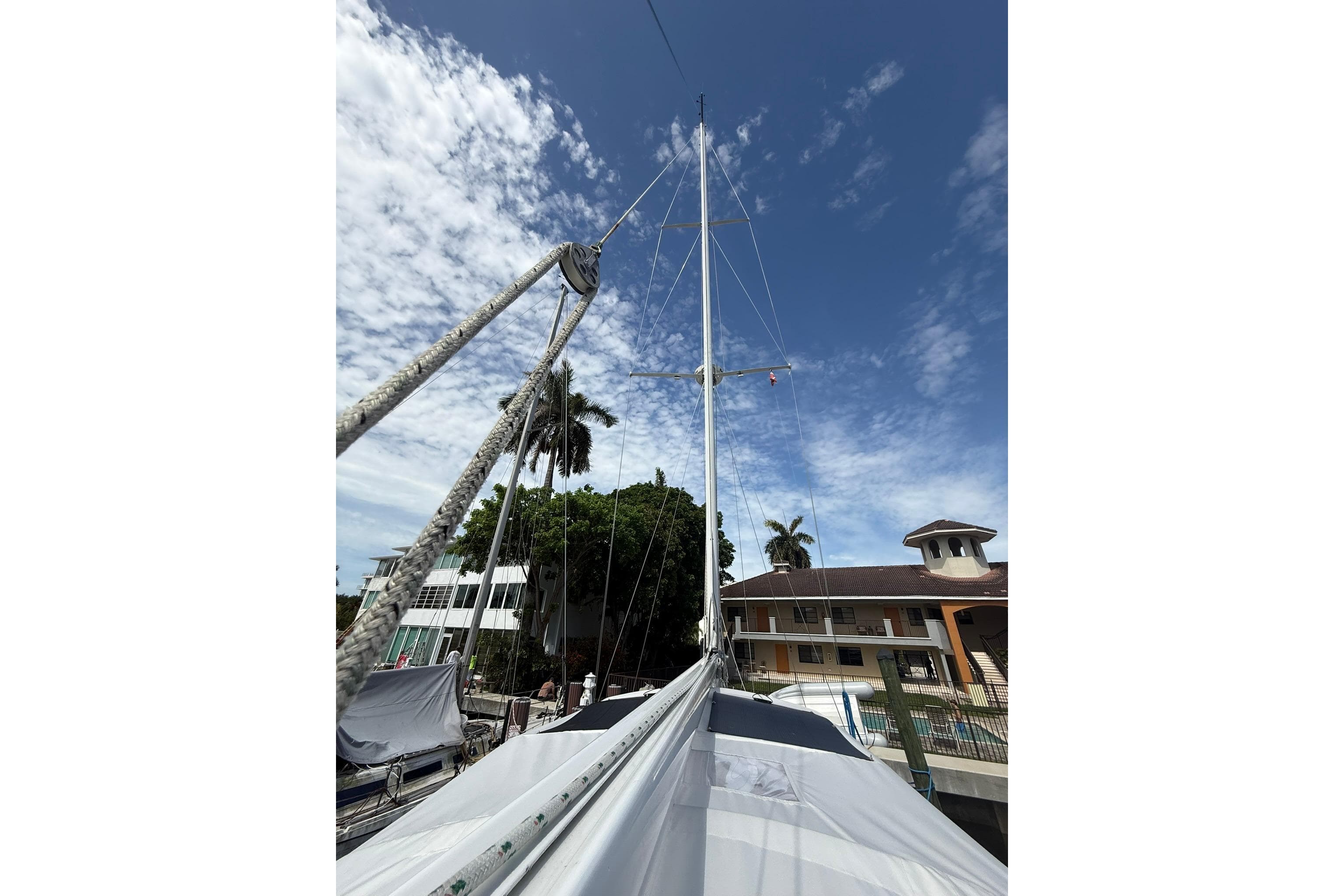 Sailboat mast of 1986 Little Harbor LH46 against a clear blue sky.