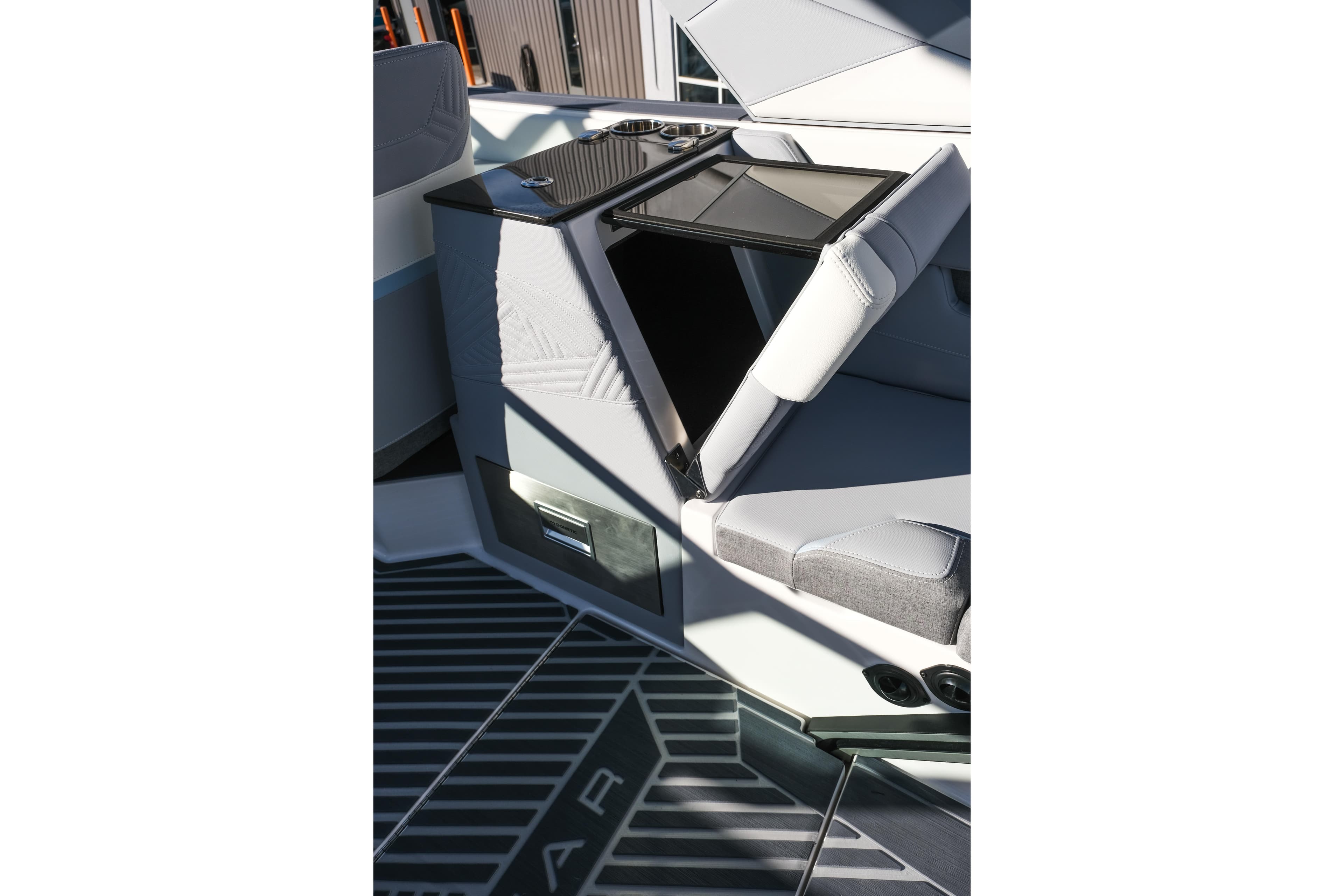 2026 MasterCraft XStar 25 interior with sleek seating and storage features.
