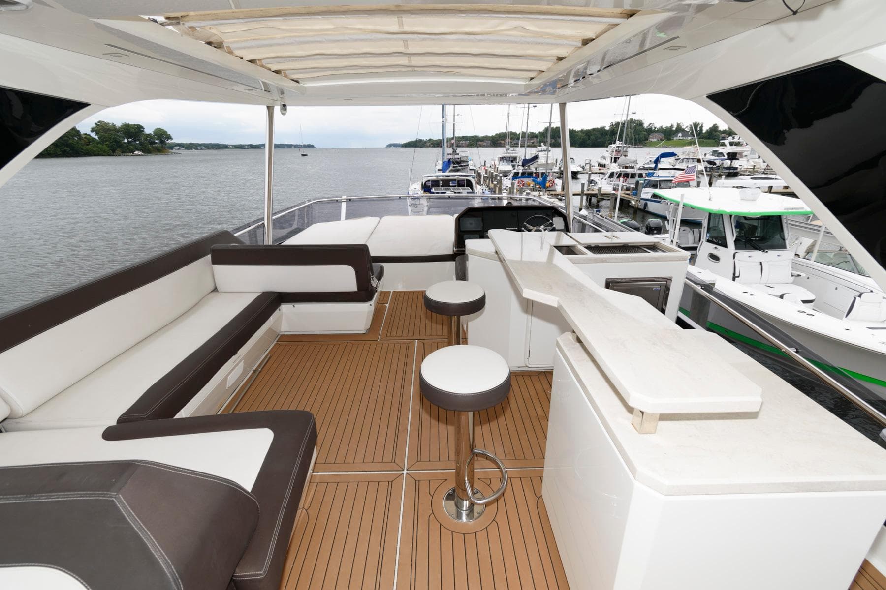 Luxurious 2018 Galeon 640 Fly yacht with spacious deck and elegant seating.