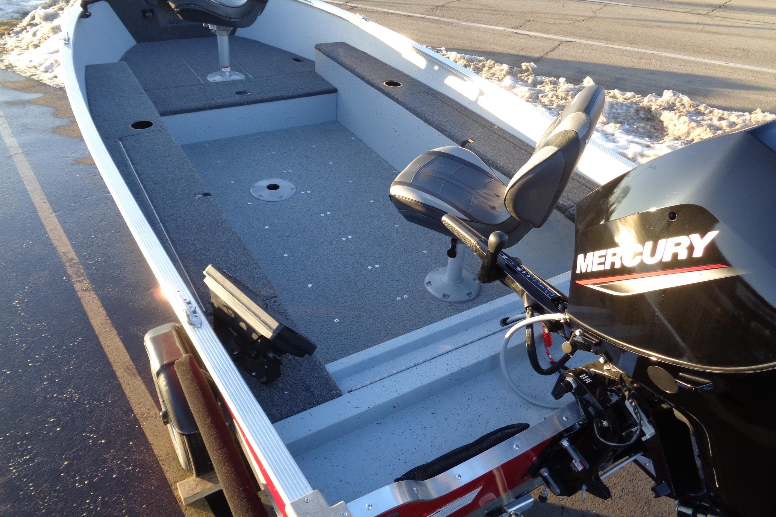 2024 Lund 1400 Fury Tiller boat with Mercury engine, interior view.
