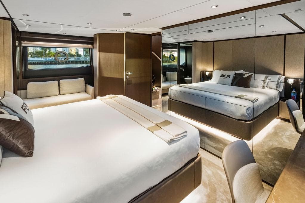 Luxurious bedroom interior of 2023 Ferretti Yachts 860 with elegant furnishings and modern design.