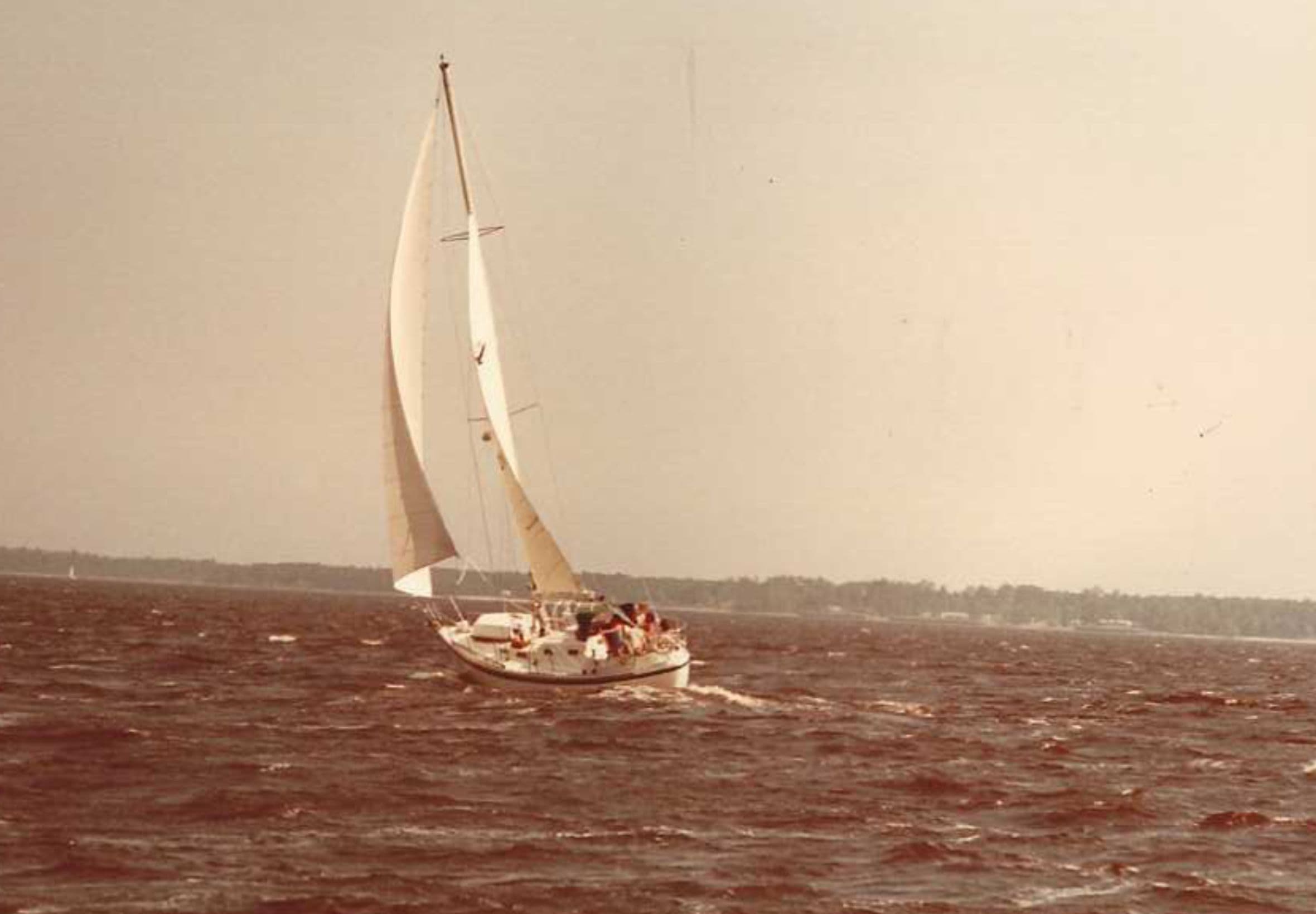 1982 Vancouver 36 sailboat navigating choppy waters.