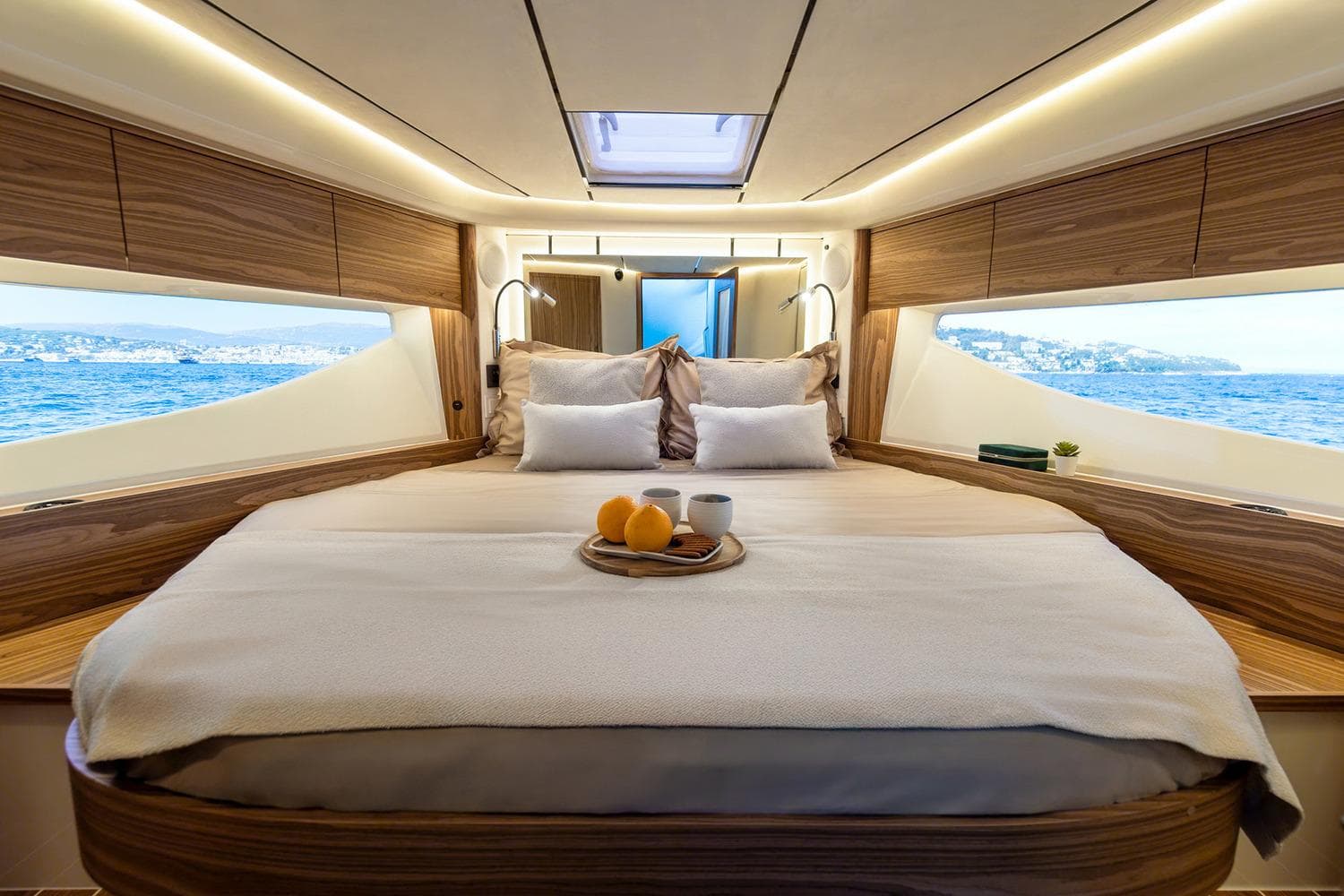 Manufacturer Provided Image: Luxurious Marex 390 yacht interior, 2025 model, featuring a cozy bedroom with ocean views.