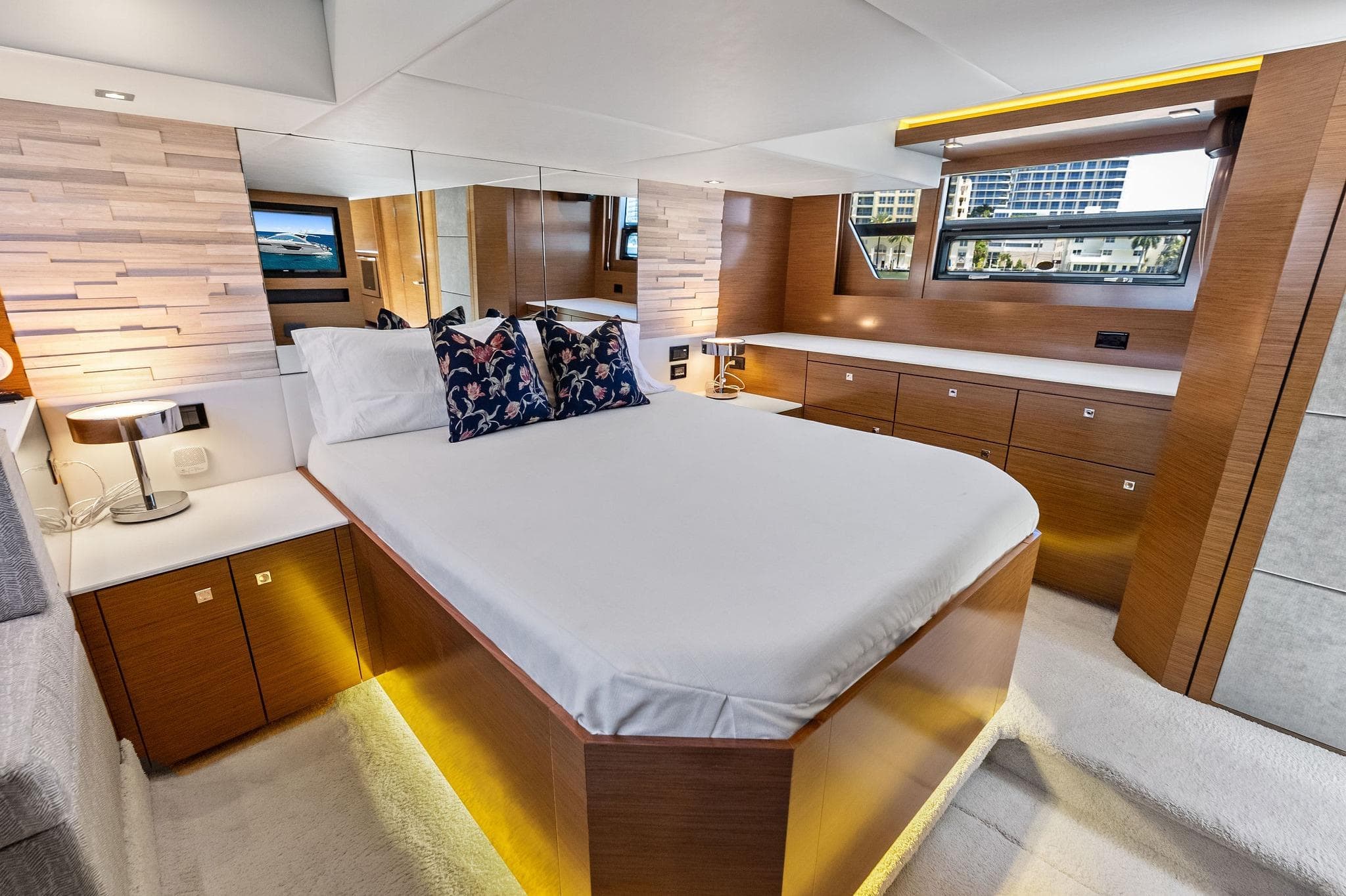 Luxurious bedroom interior of 2019 Cruisers Yachts 54 Cantius with modern design elements.