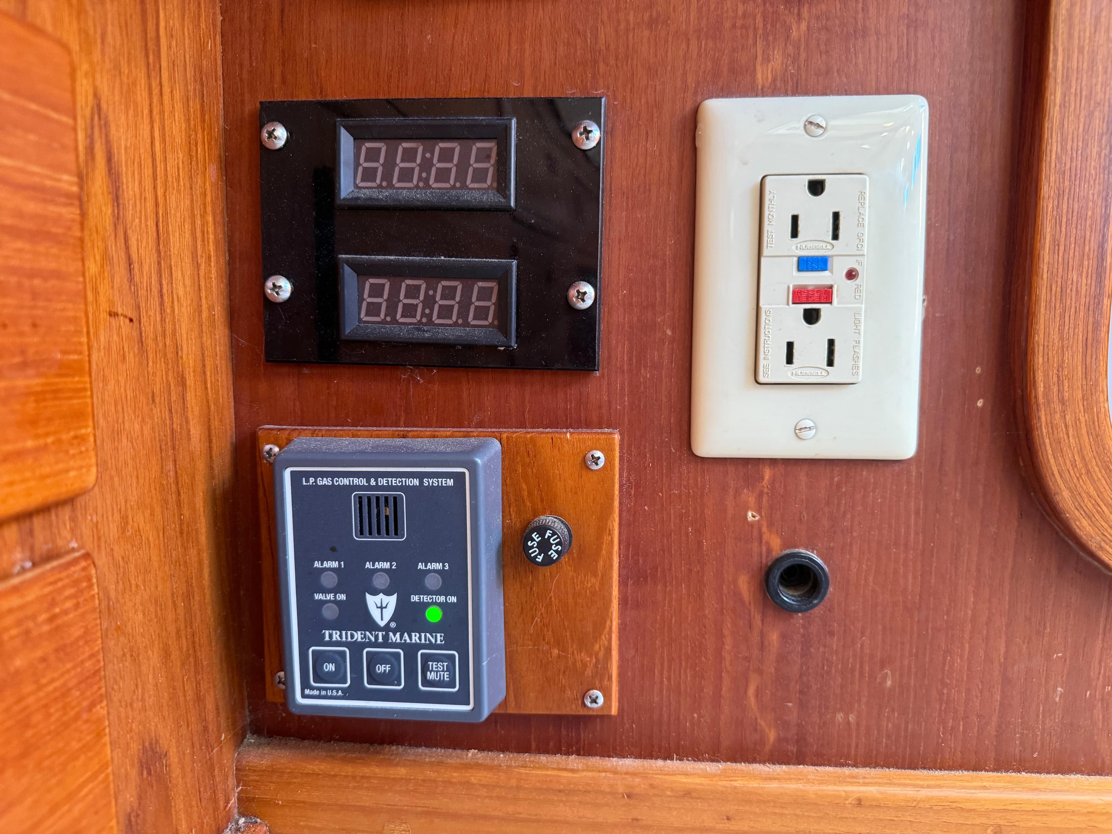 Control panel and outlet on 1986 Baltic Custom Farr 44 yacht interior.