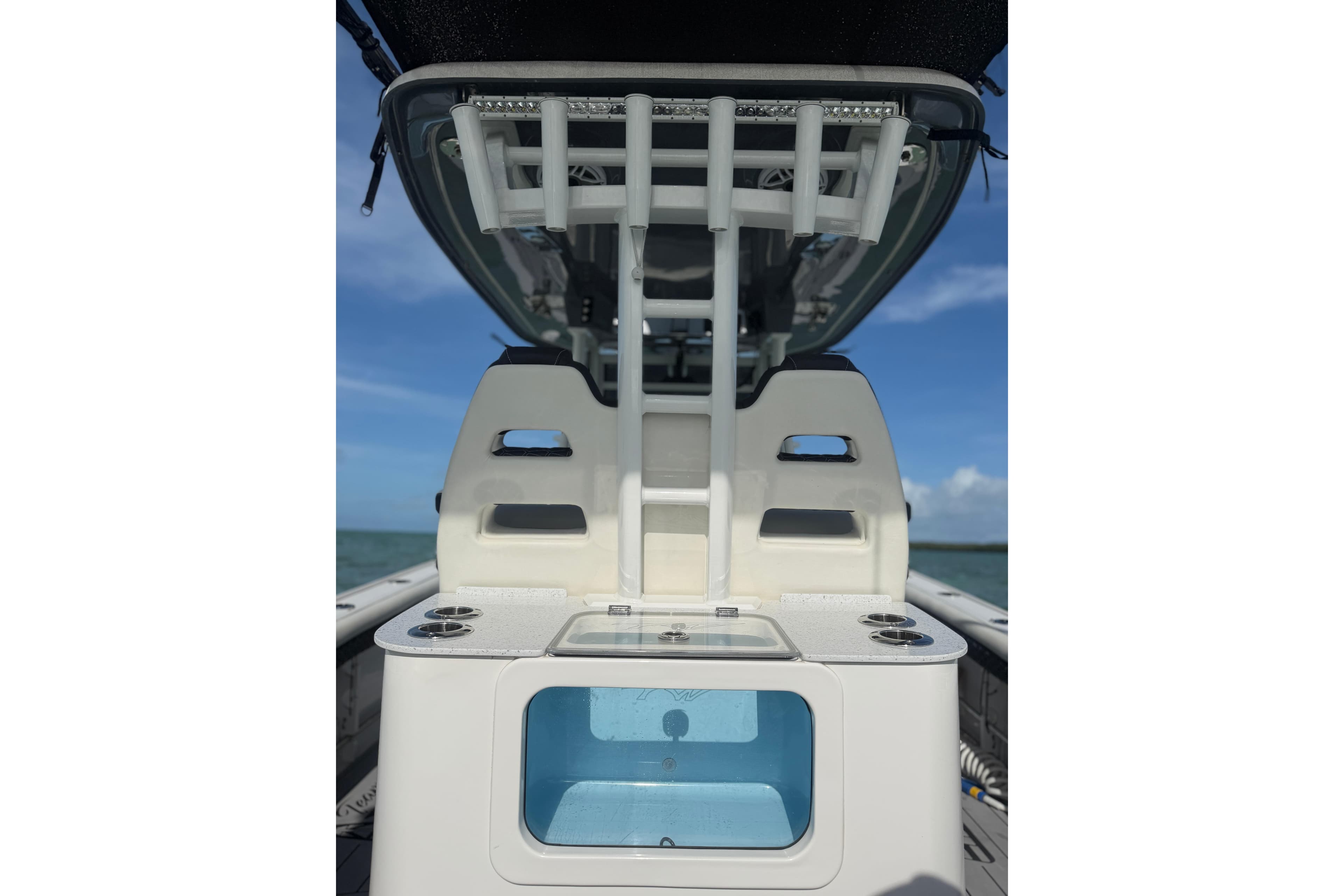 2024 Tidewater 3100 Carolina Bay boat interior with rod holders and storage compartments.