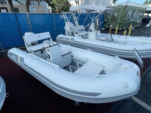 2023 ZAR Mini RIB 12 T inflatable boat displayed at a marina.