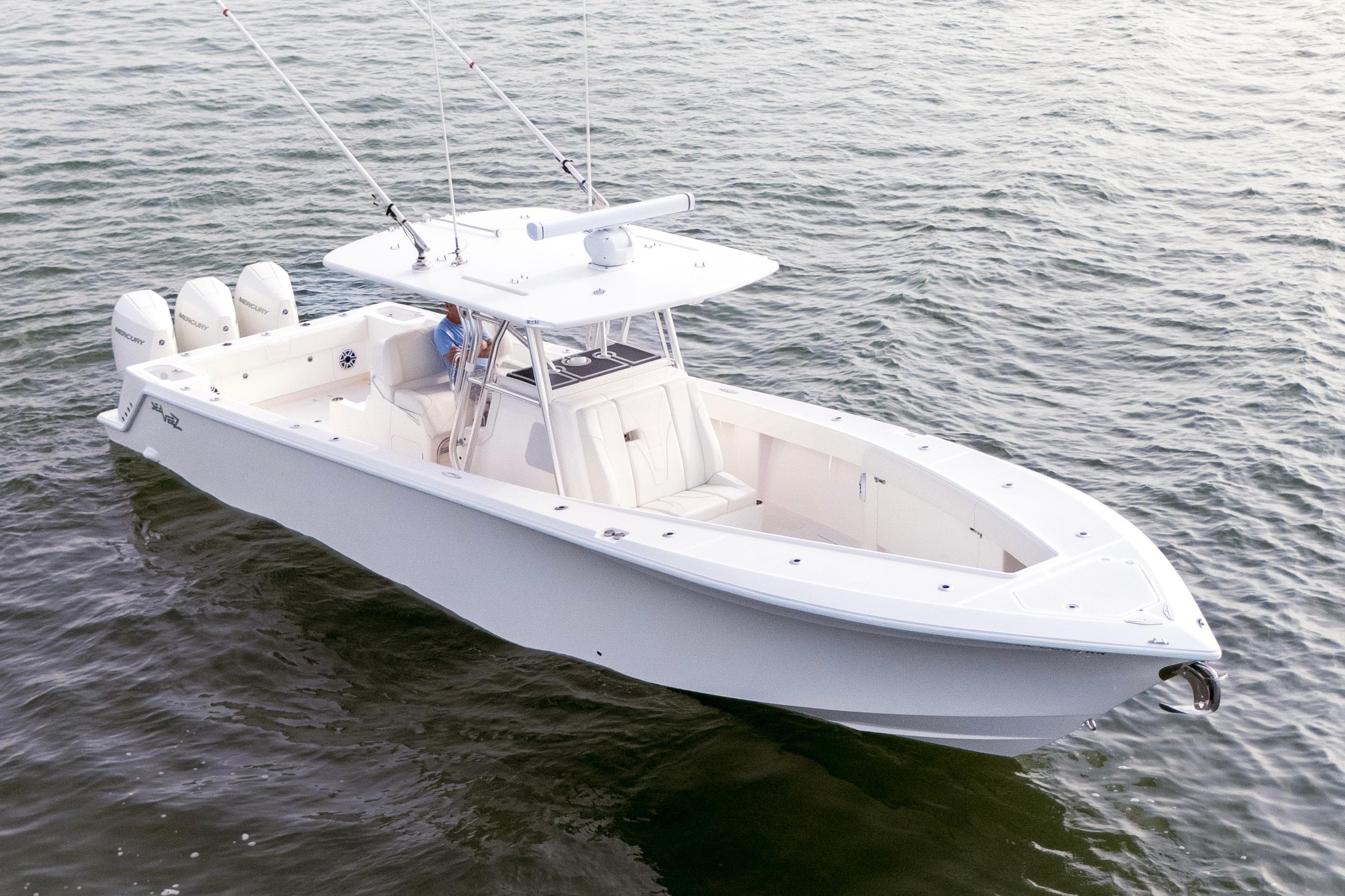 2022 SeaVee 370Z boat on water, featuring triple outboard engines.