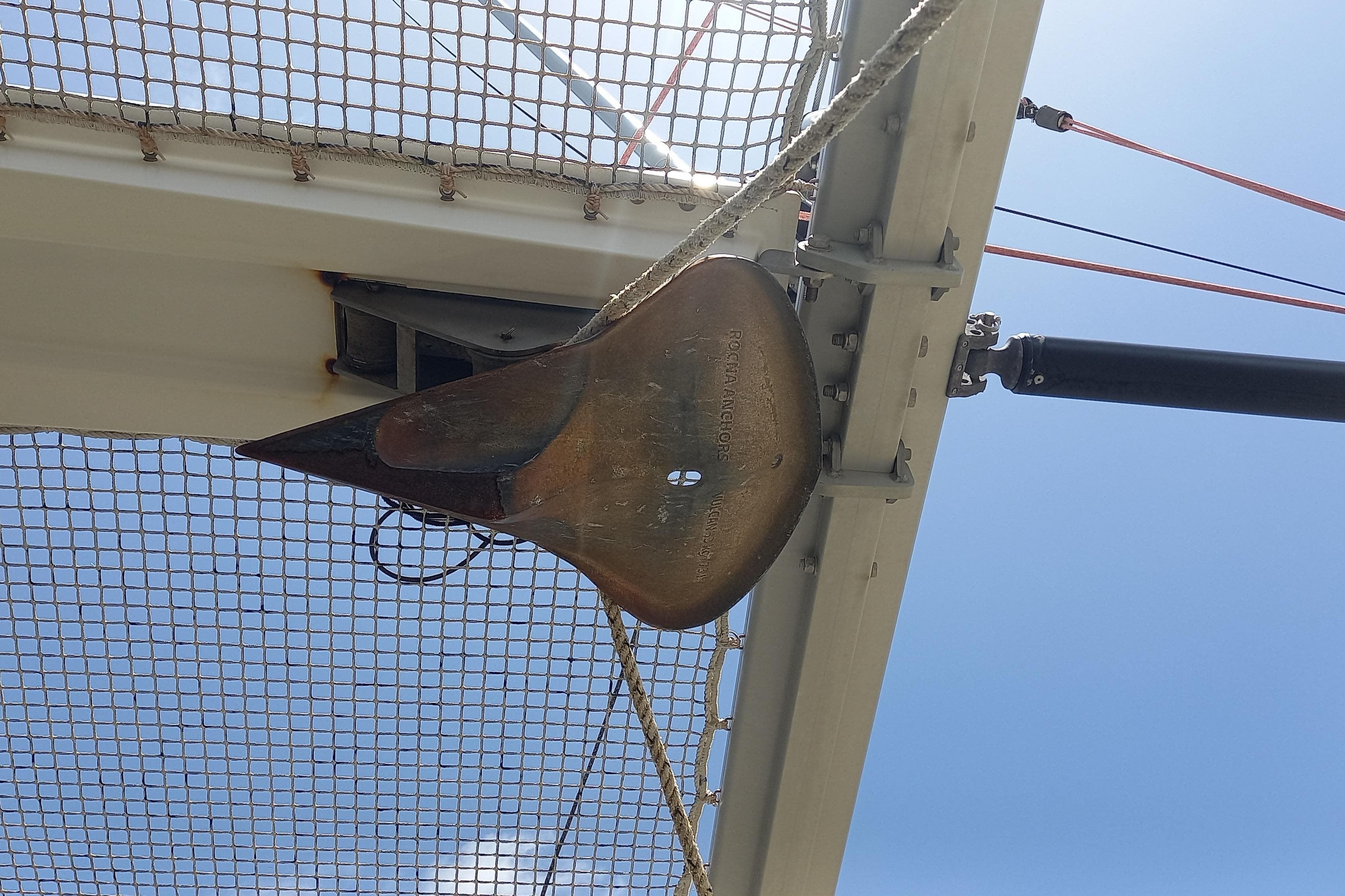 Anchor on Nautitech 46 Open catamaran, 2021 model, against blue sky background.