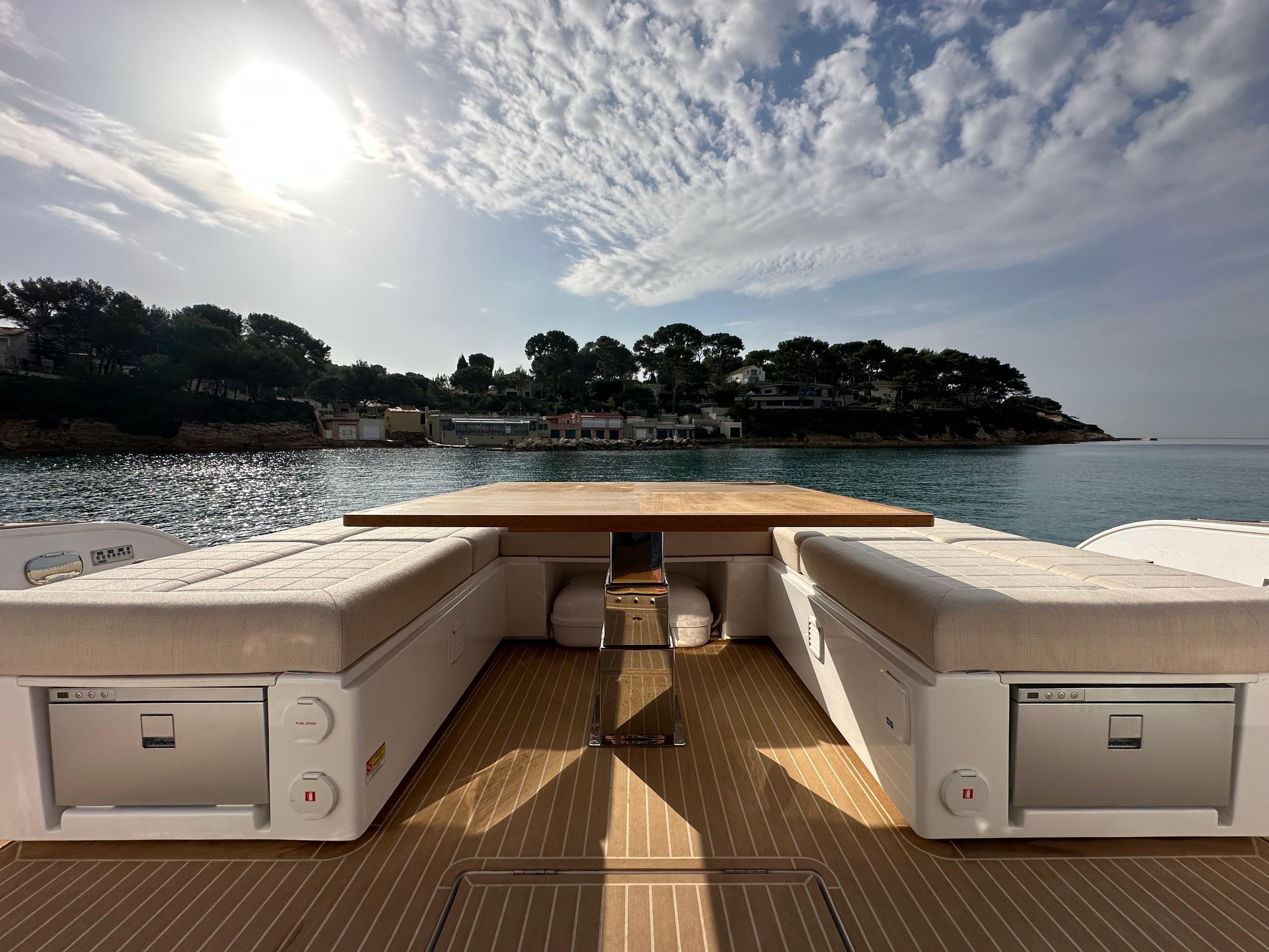 Luxury 2023 Pardo Yachts GT 52 deck with scenic coastal view.