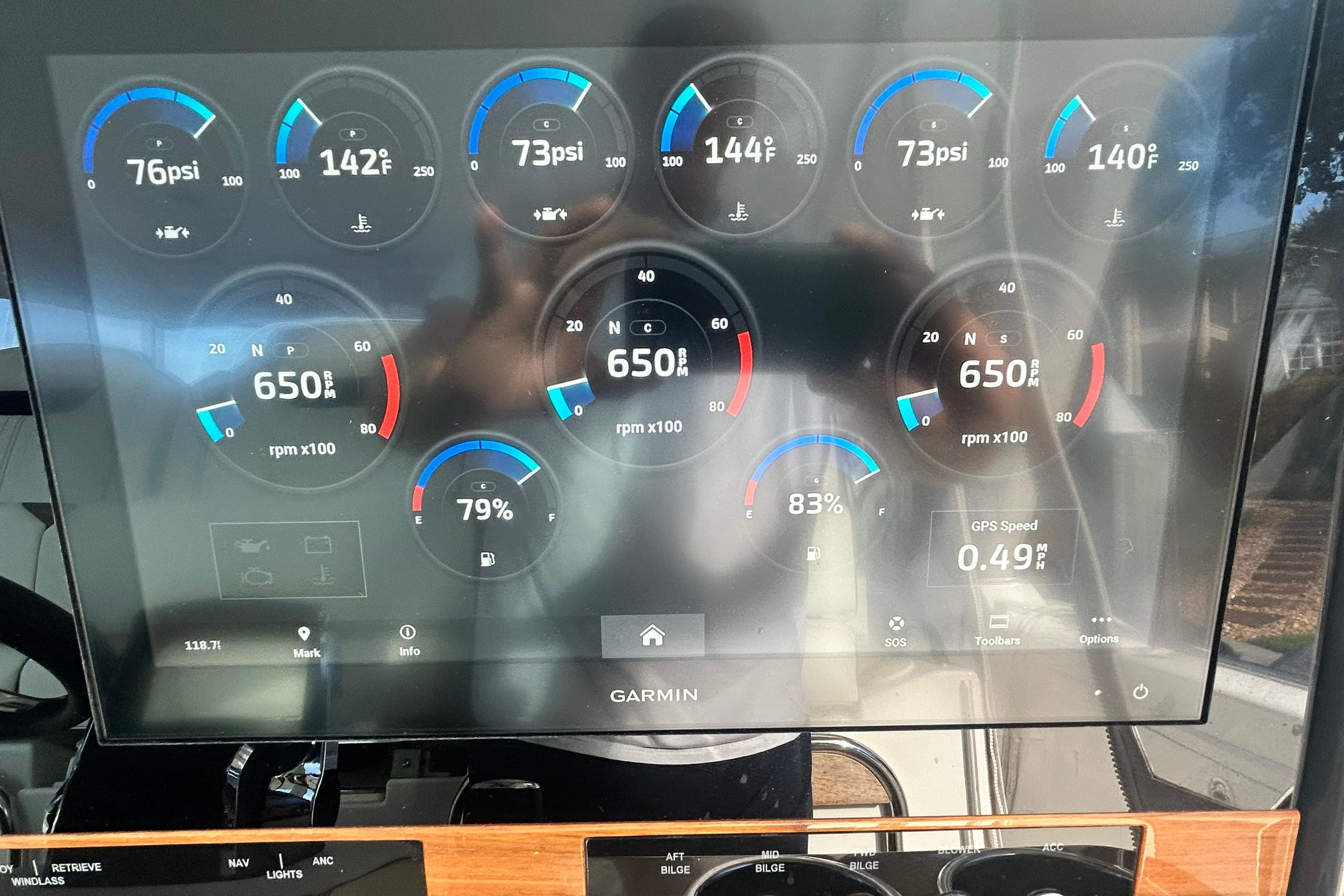 Dashboard of 2023 Tiara Yachts 38 LS showing engine metrics and GPS speed.