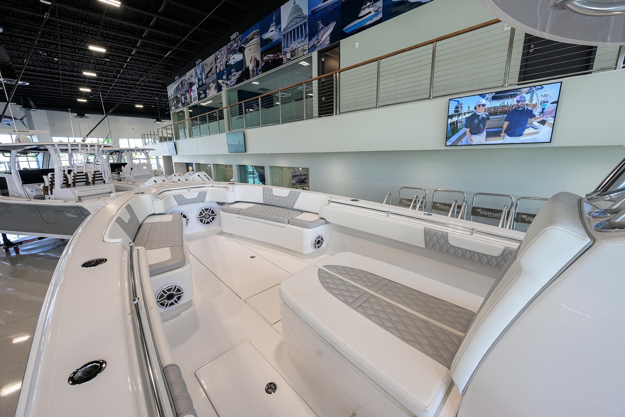 2025 Contender 39 ST boat interior with spacious seating and modern design in showroom.