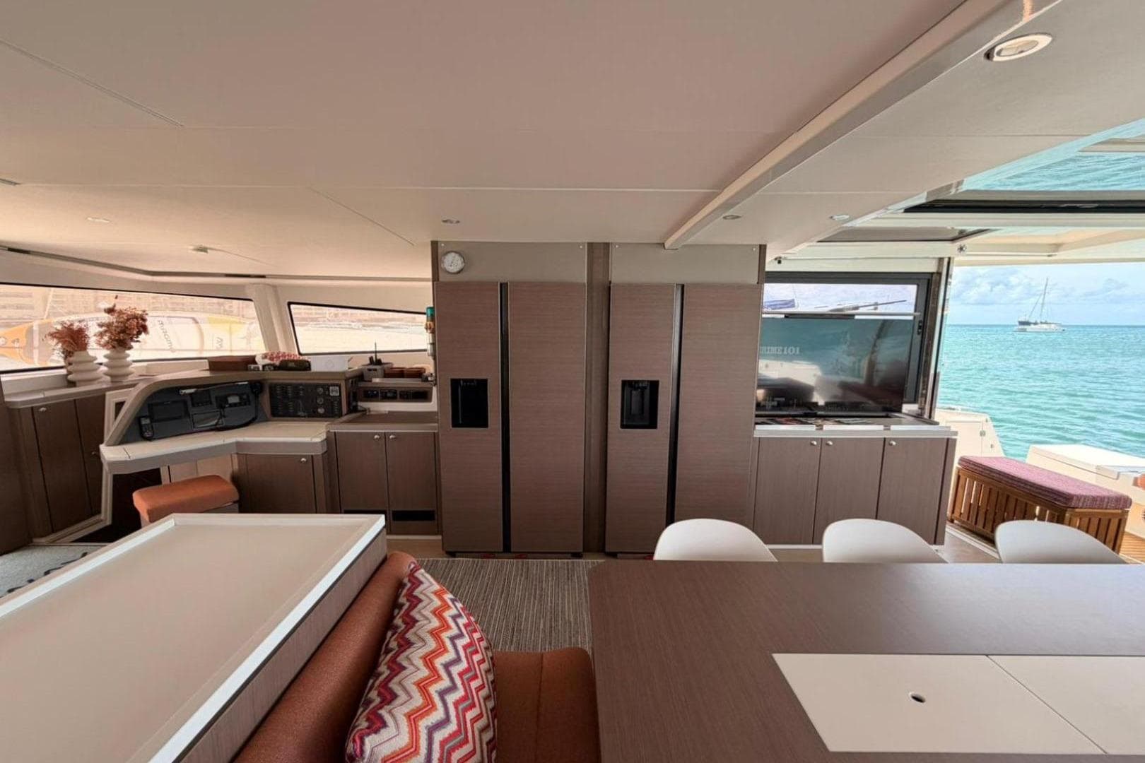 Luxurious interior of a 2020 Bali 5.4 yacht with modern kitchen and ocean view.
