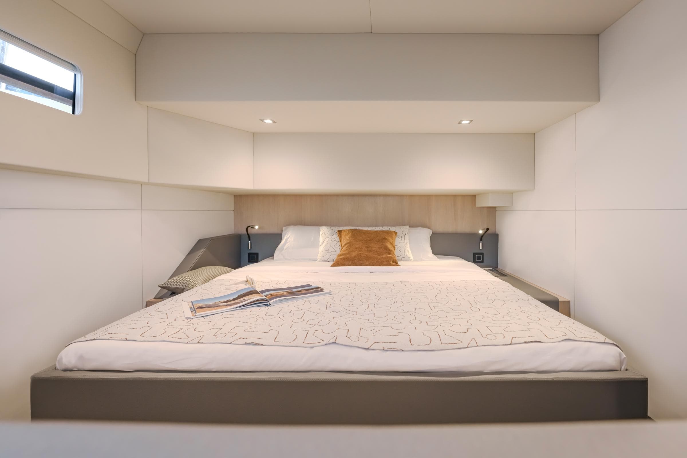 Luxurious bedroom interior of 2025 Privilege Signature 650 yacht with modern design.