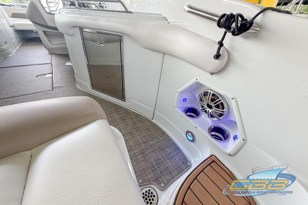 Interior of 2015 Crownline Eclipse E6 boat with speaker and seating area.