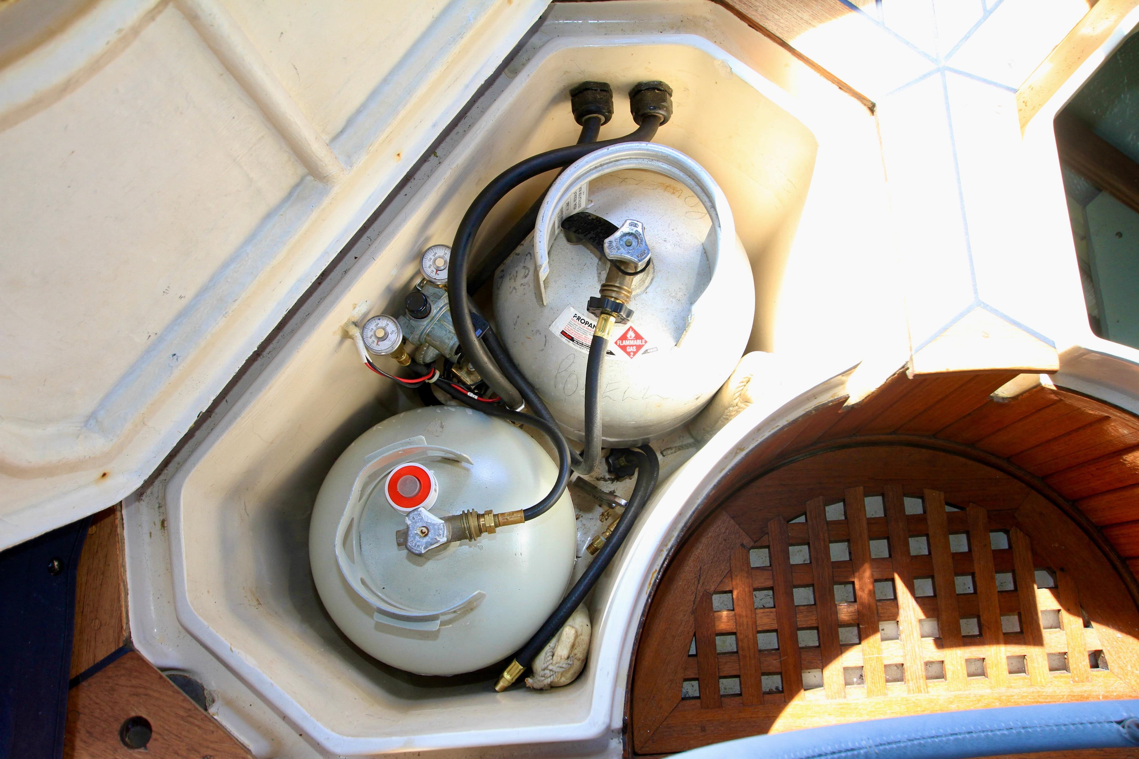 Propane tanks in storage compartment of 1981 Ta-Shing Panda 40 sailboat.
