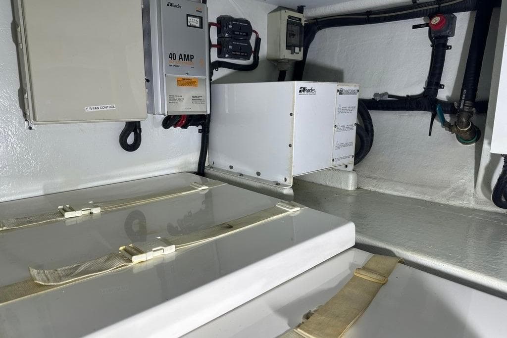 Engine room of 2011 Kadey-Krogen 48 AE with electrical components and wiring.