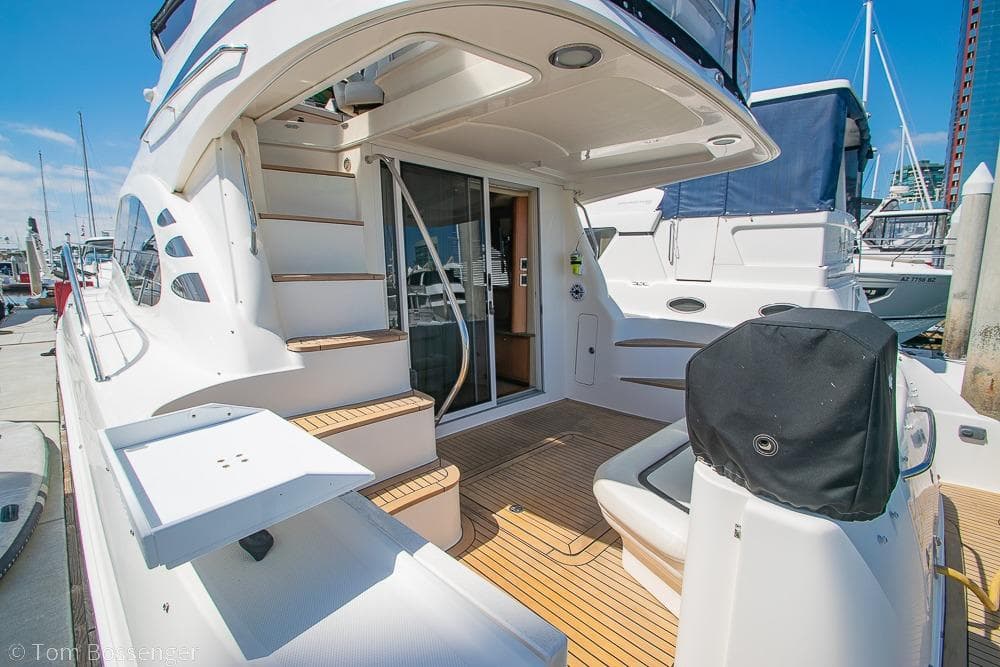 2005 Sea Ray 420 Sedan Bridge yacht with spacious deck and elegant design.