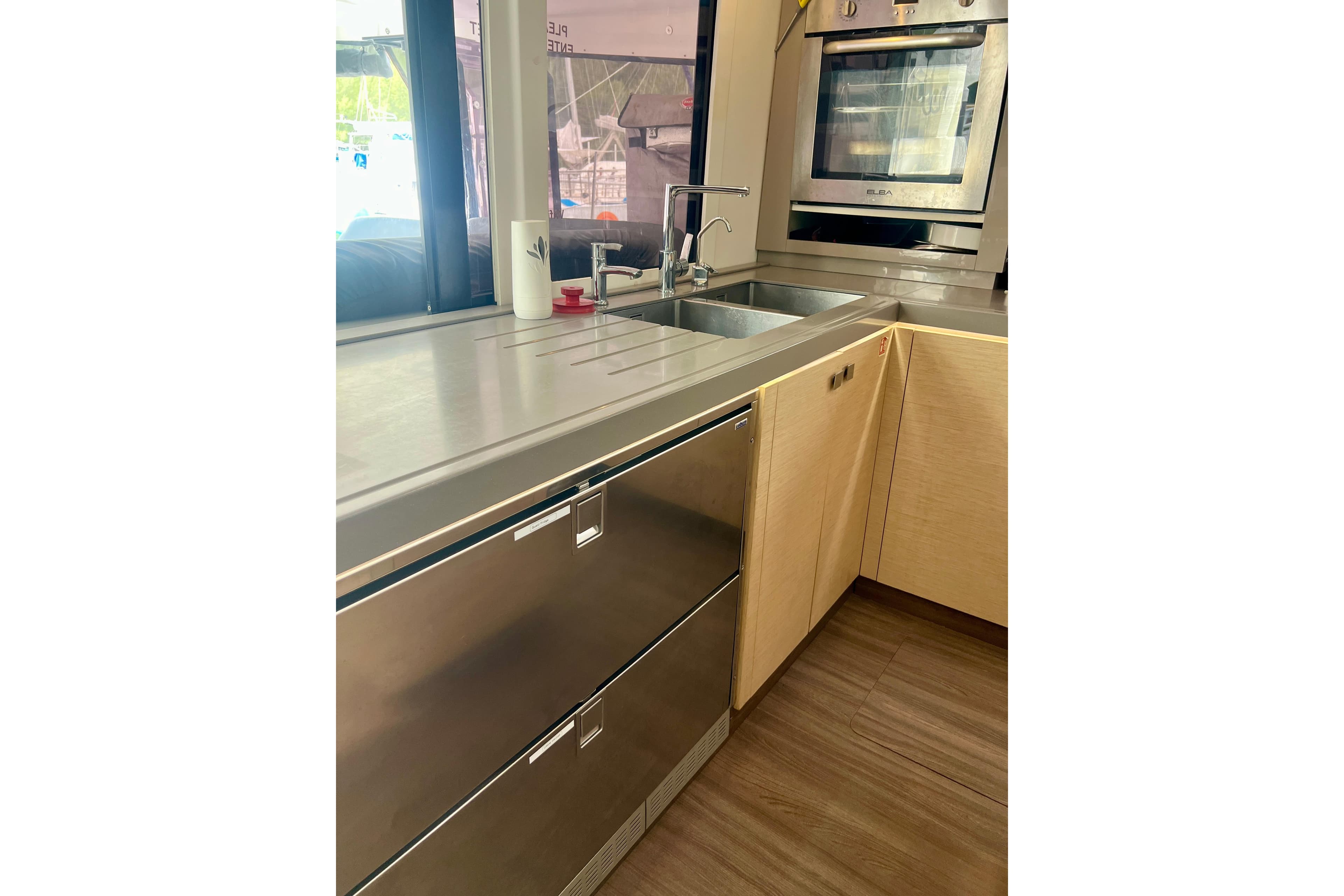 Modern kitchen interior of 2018 Fountaine Pajot Saona 47 catamaran.