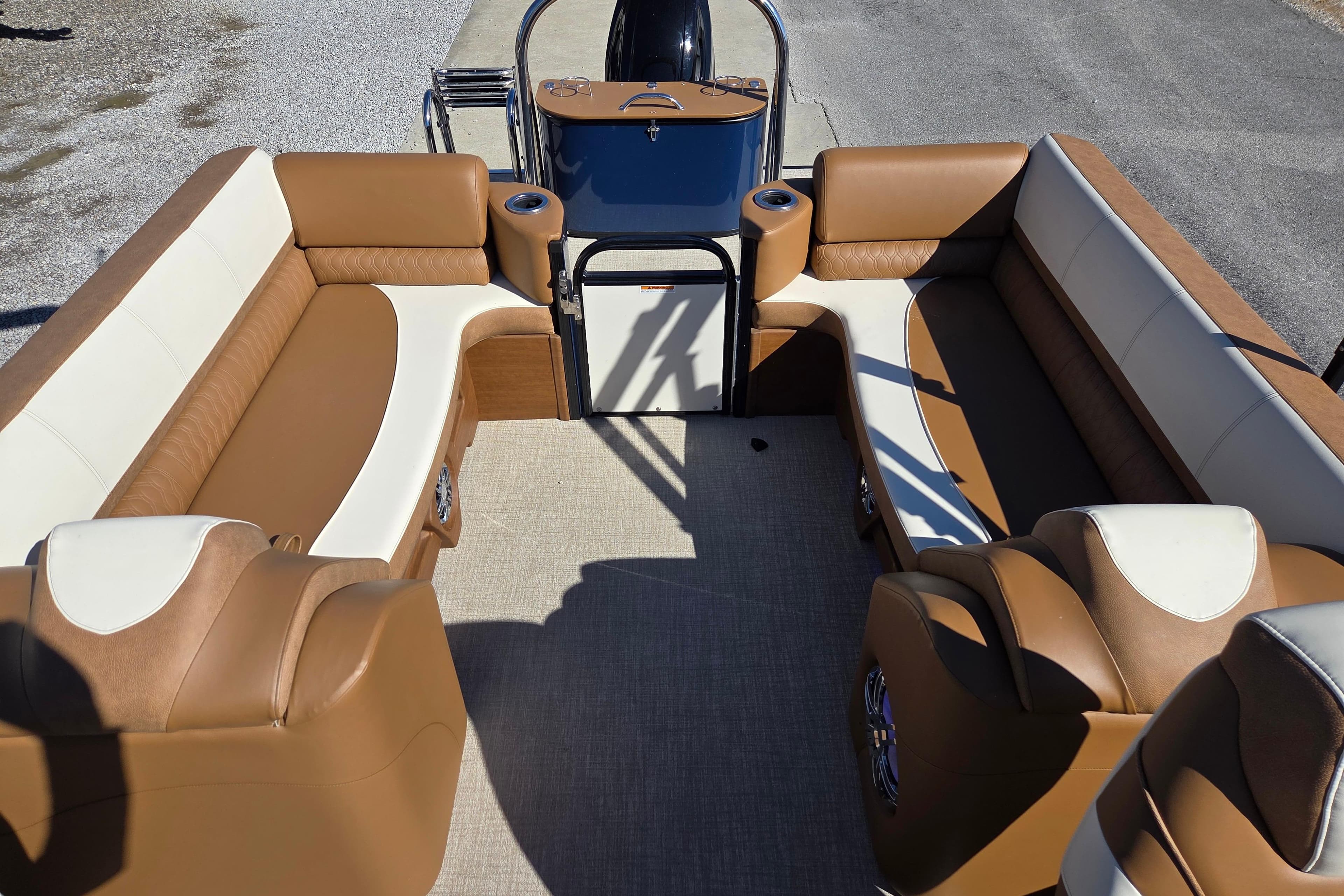 2023 Avalon Platinum 2385 Catalina Quad Lounger with luxurious tan and white seating.