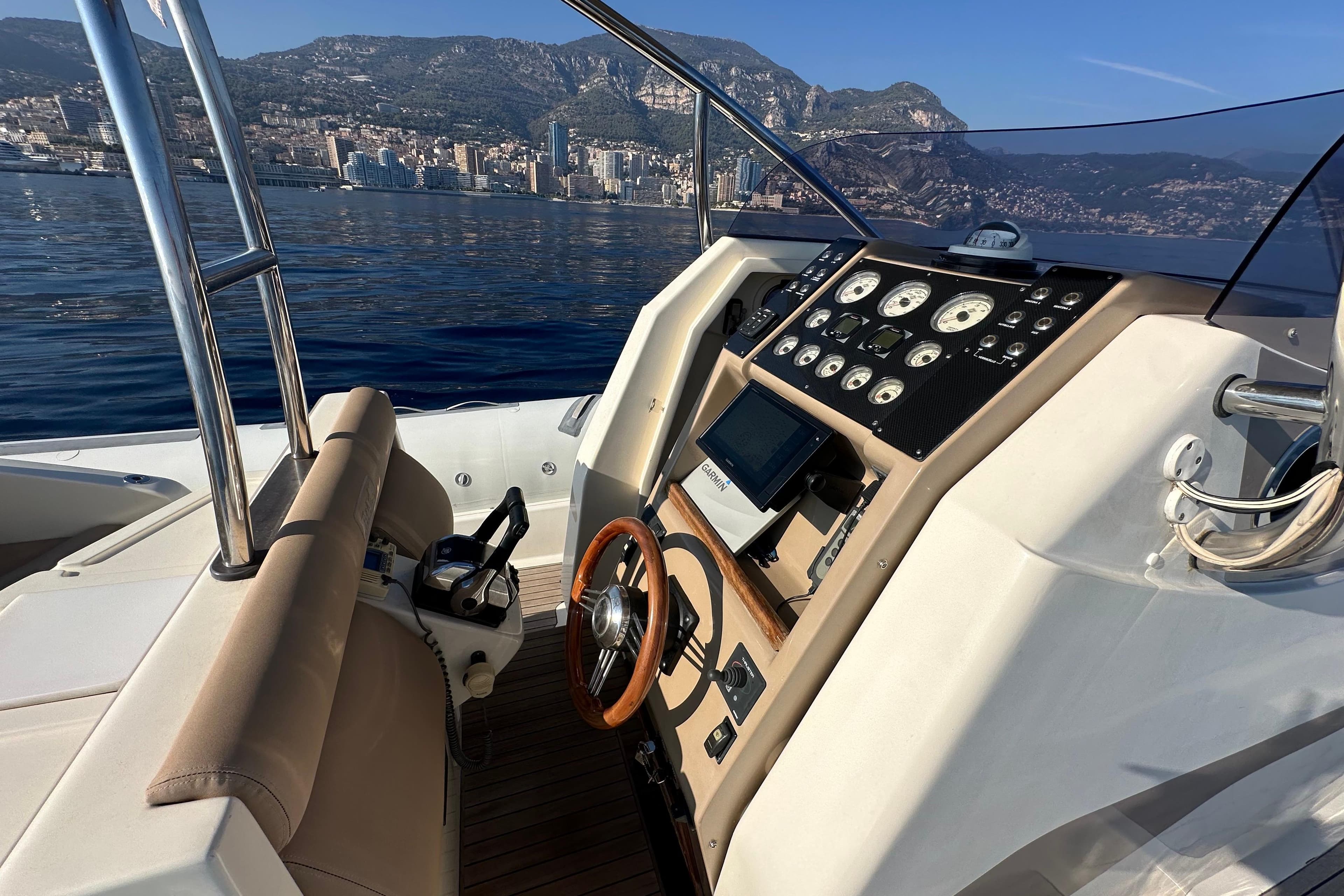 Luxury BWA 44 yacht cockpit with scenic coastal view, 2006 model.