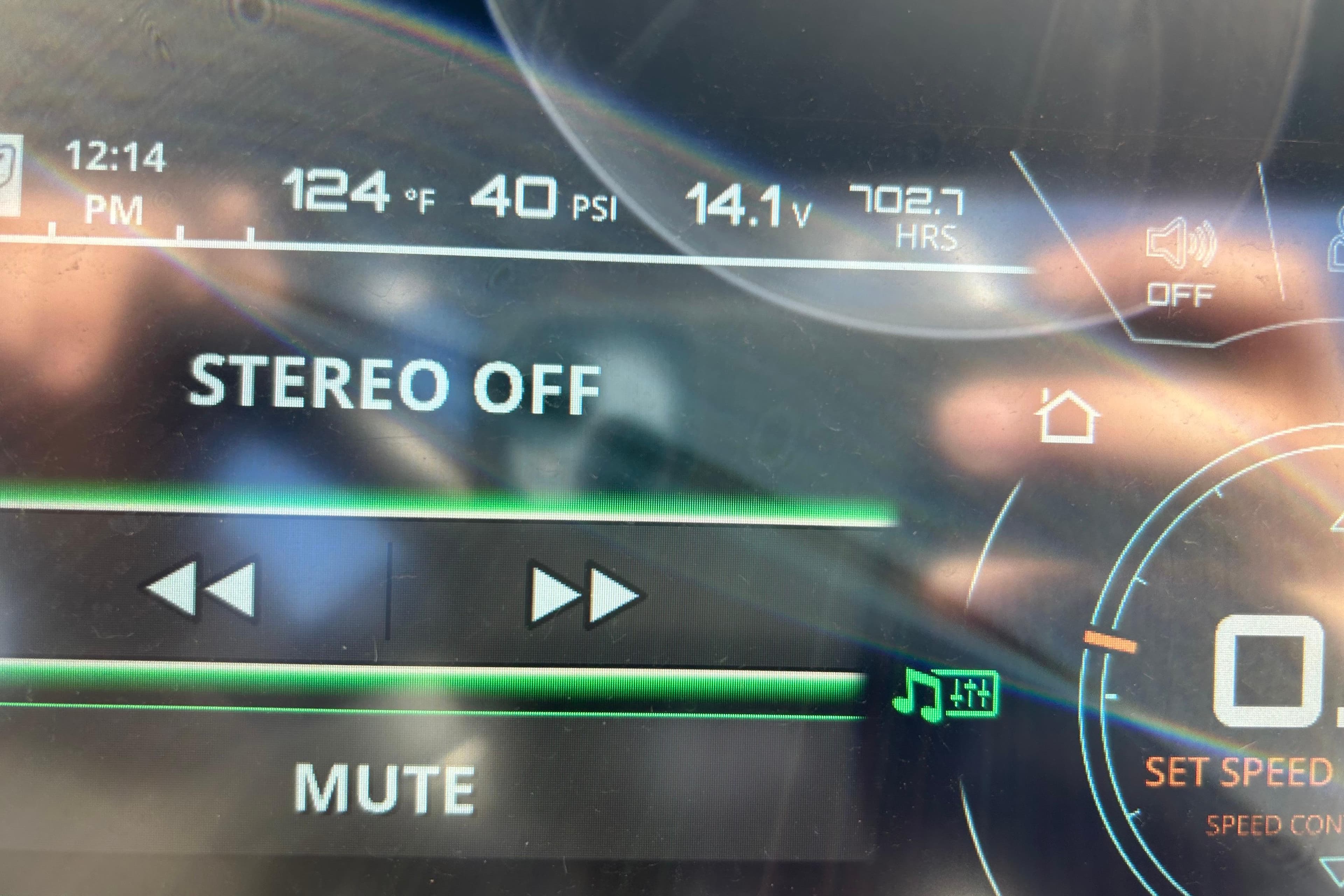Close-up of 2017 Nautique Super Air Nautique G23 dashboard display showing stereo off and system metrics.