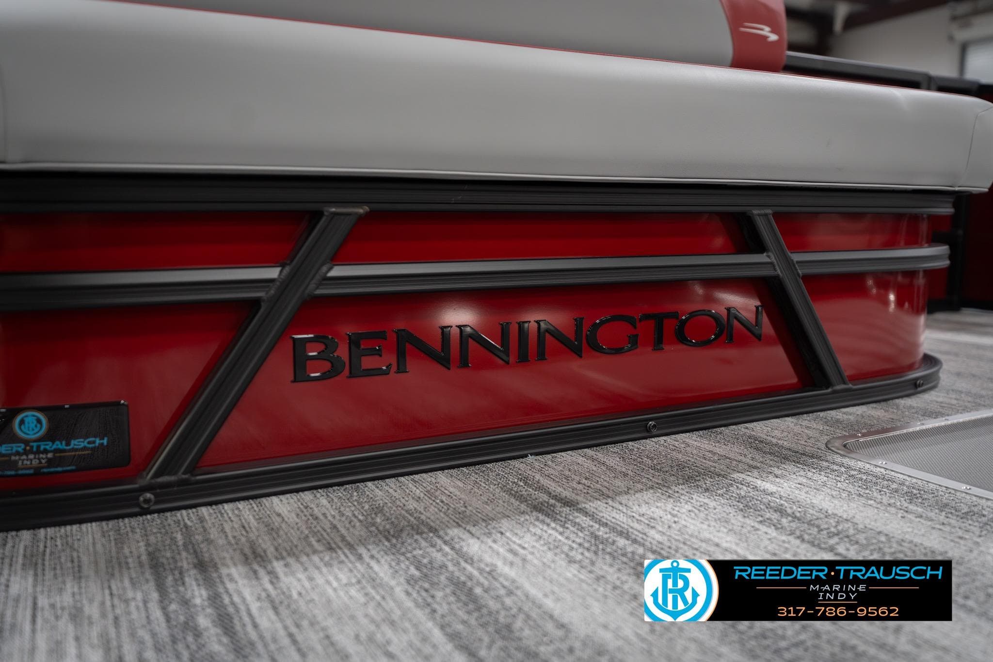 2026 Bennington 22 SLJ pontoon boat, red exterior, Reeder-Trausch Marine branding.