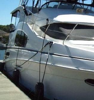 2005 Silverton 39 Motor Yacht docked at marina.