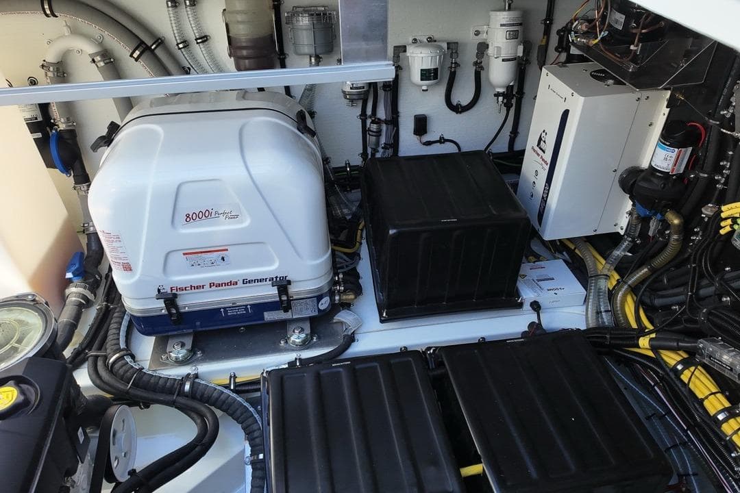 Engine room of 2026 Targa 41 with Fischer Panda generator and wiring.