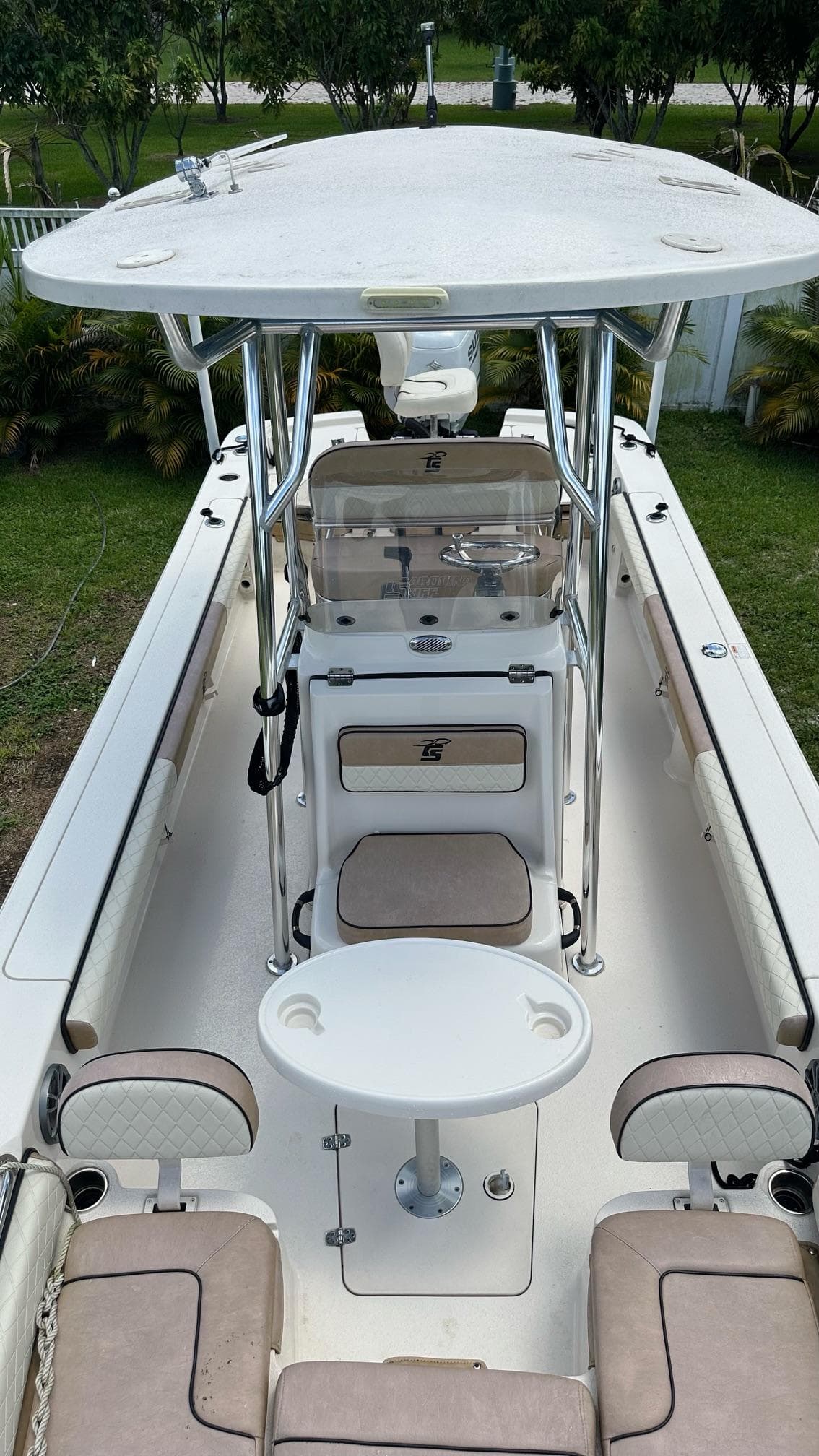 2023 Carolina Skiff 24 Ultra Elite boat interior with seating and console.