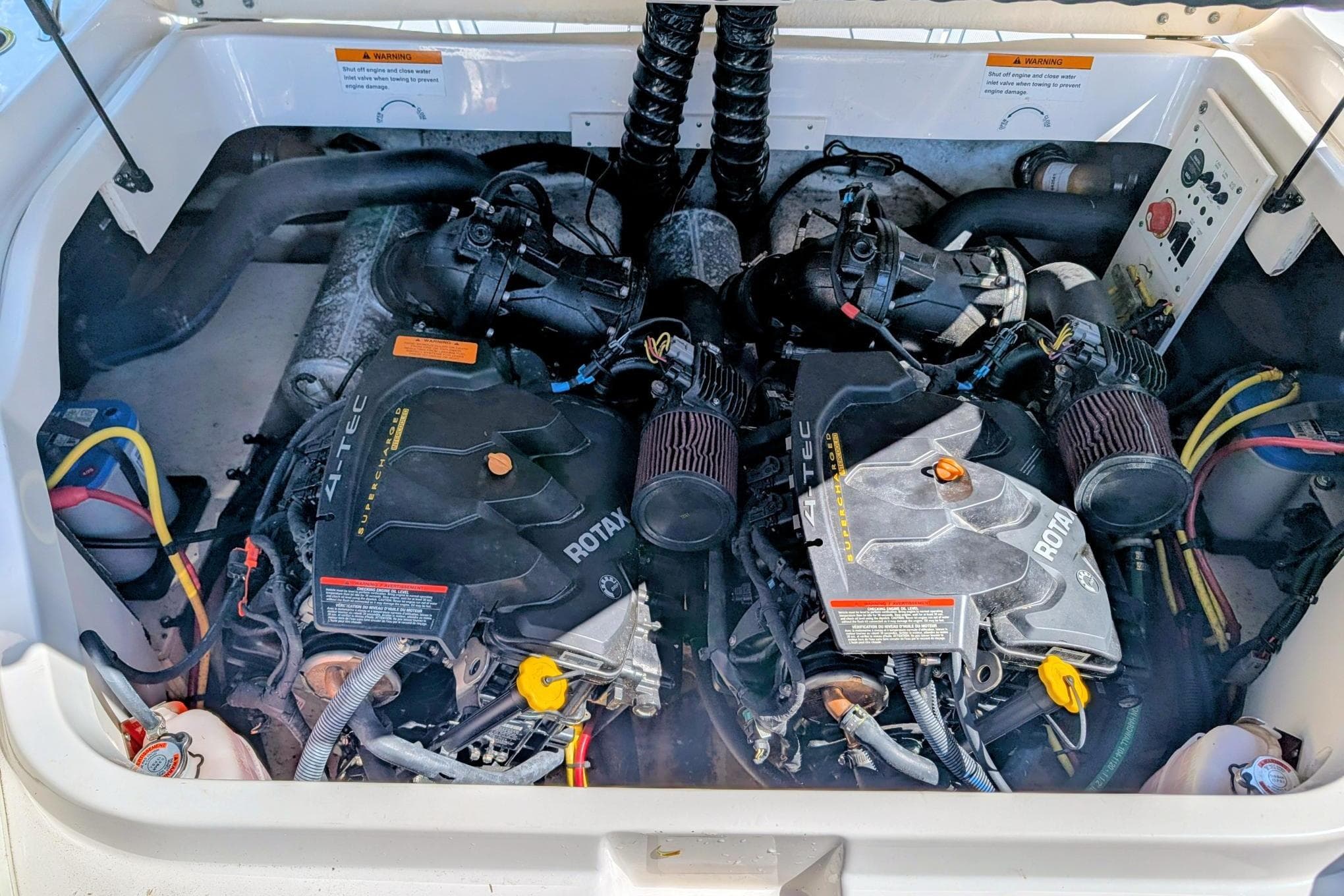 Engine compartment of 2017 Chaparral Vortex 223 VRX with dual Rotax engines.