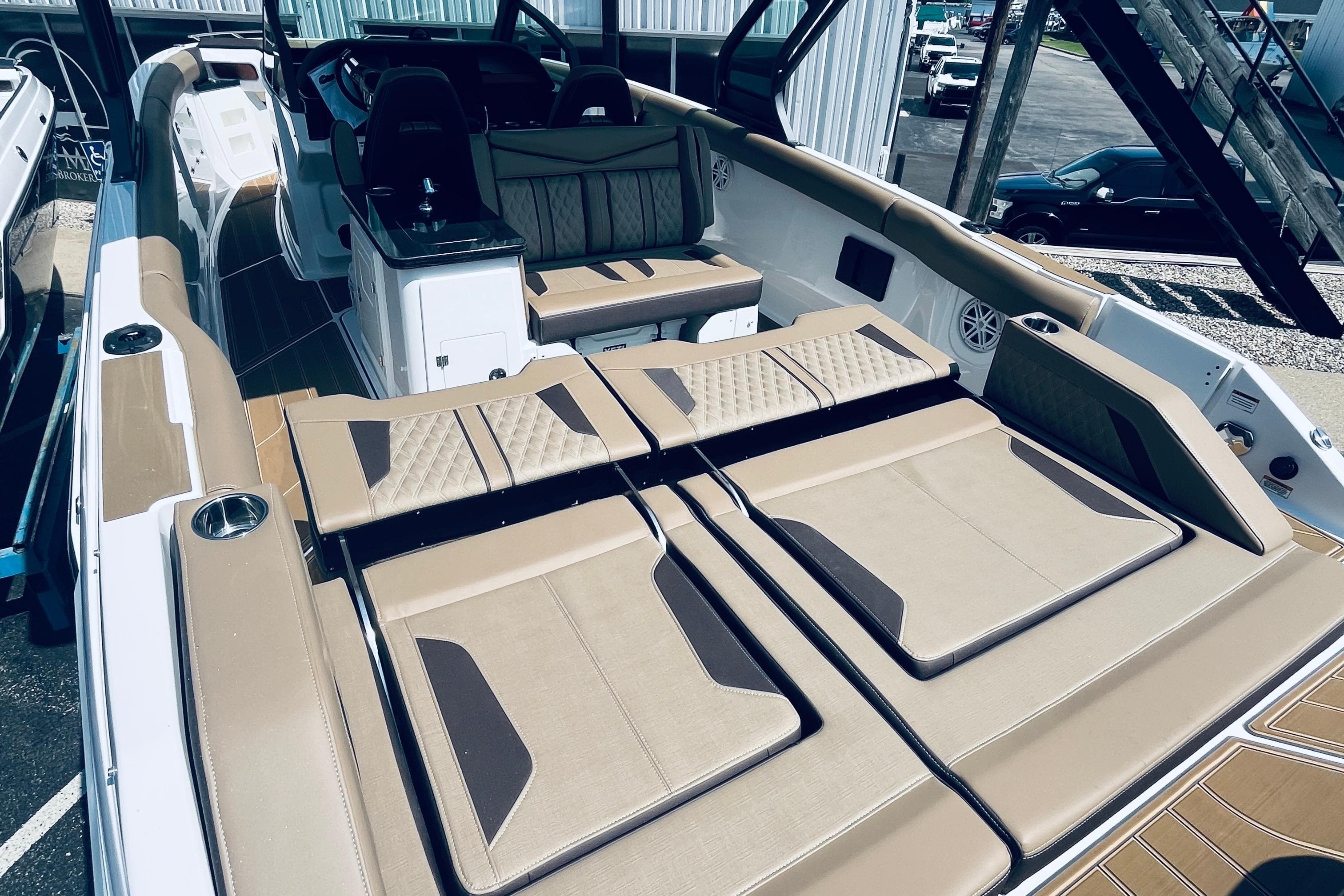 2026 Monterey Elite 30 OB boat with luxurious seating and modern design.
