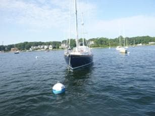 1968 Hinckley Pilot 35 sailboat on calm water.