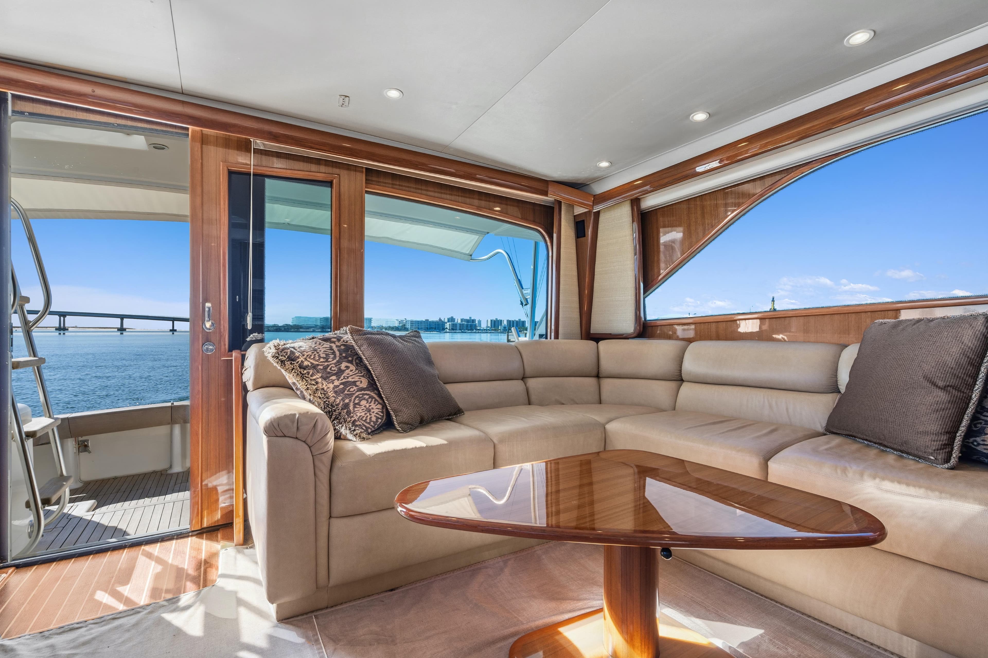 Luxurious interior of 2007 Viking 56 Convertible yacht with plush seating and ocean view.