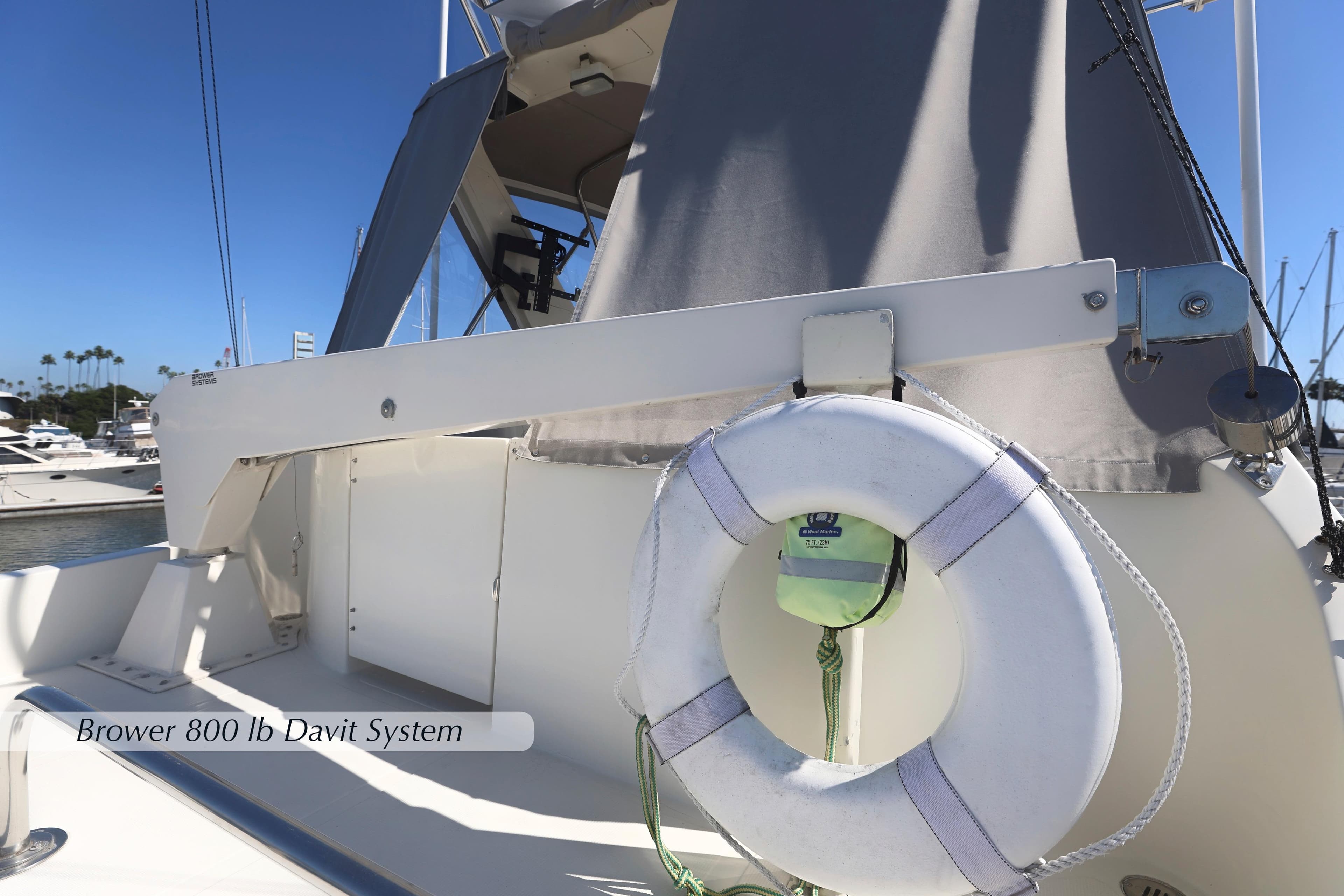 2004 McKinna 57 Pilothouse with Brower 800 lb Davit System and life preserver.