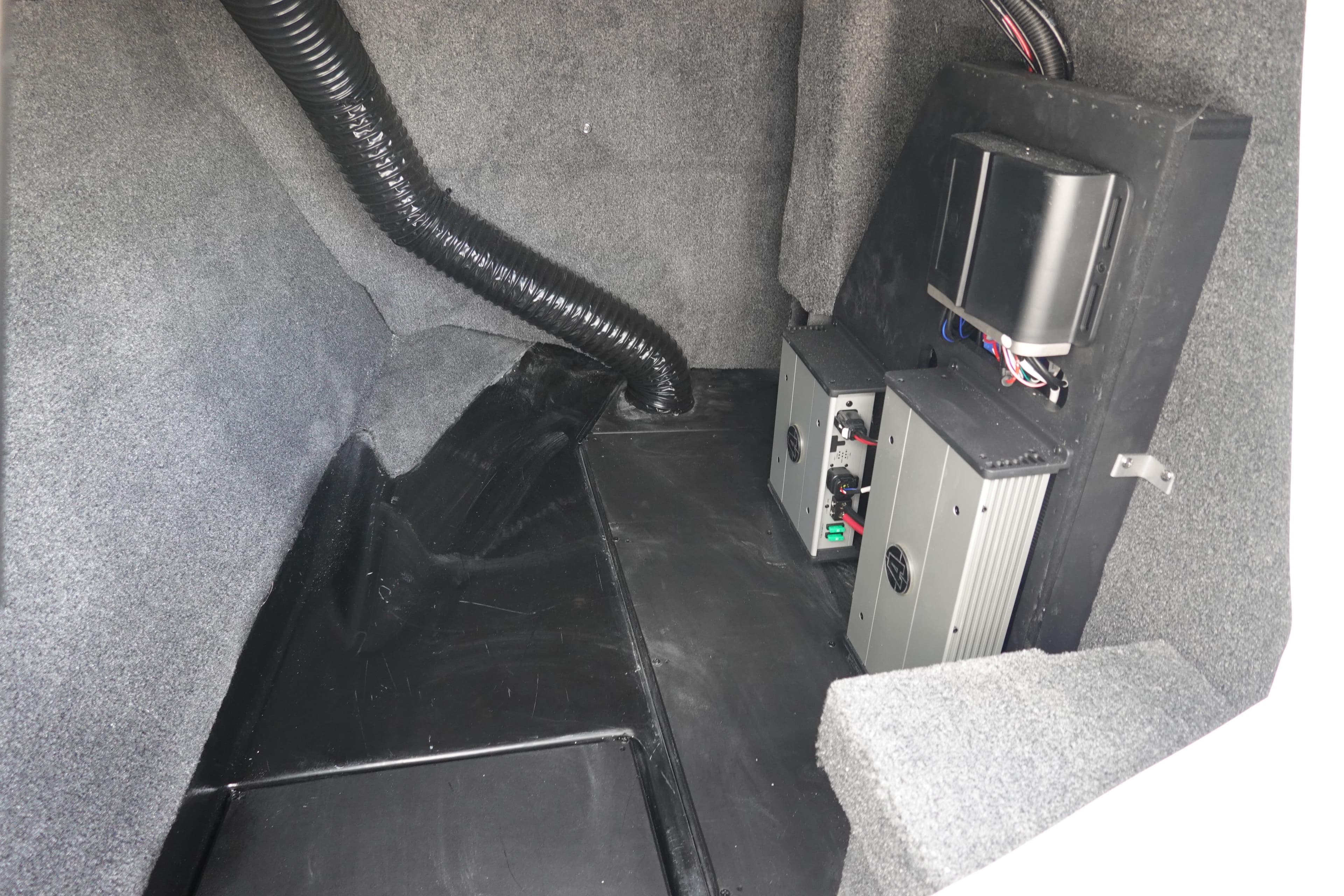 2023 Axis A24 interior compartment with electronic components and wiring.