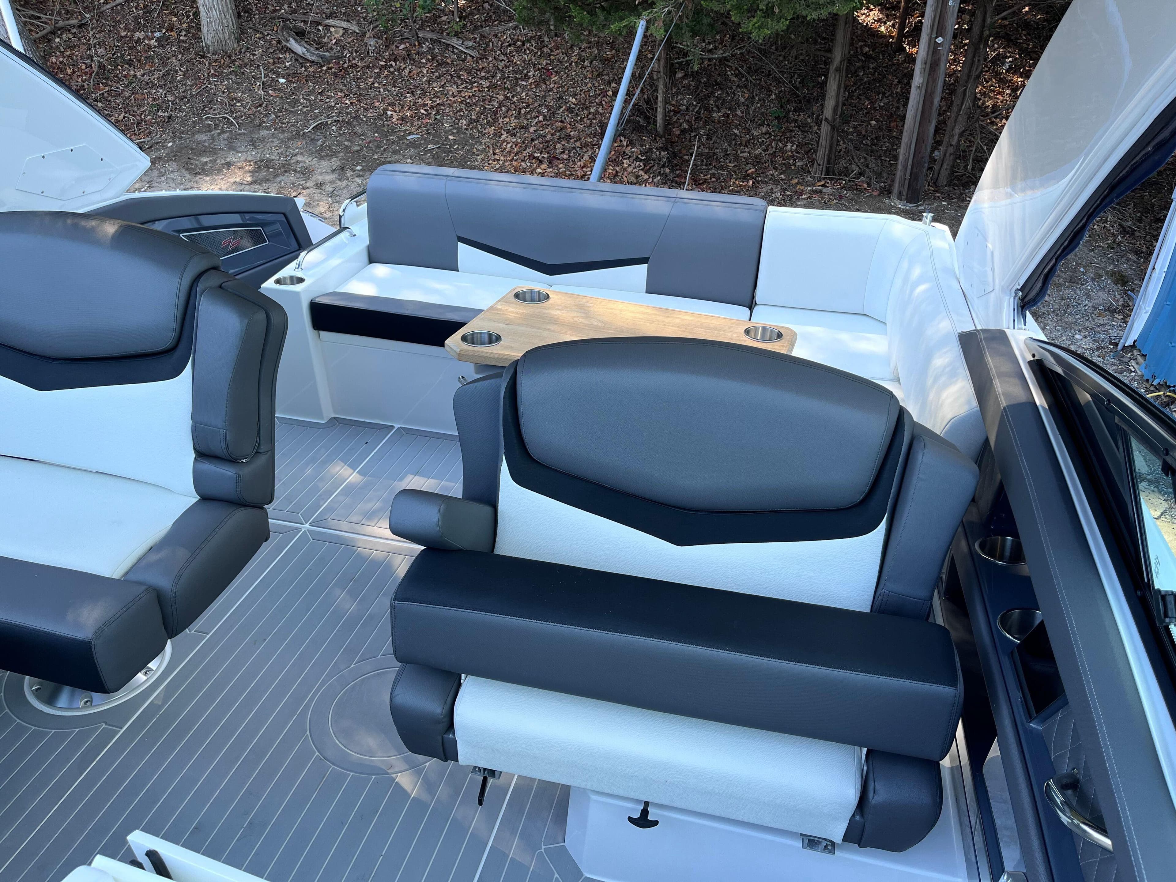 2021 Cruisers Yachts 338 CX IO interior with sleek seating and modern design.