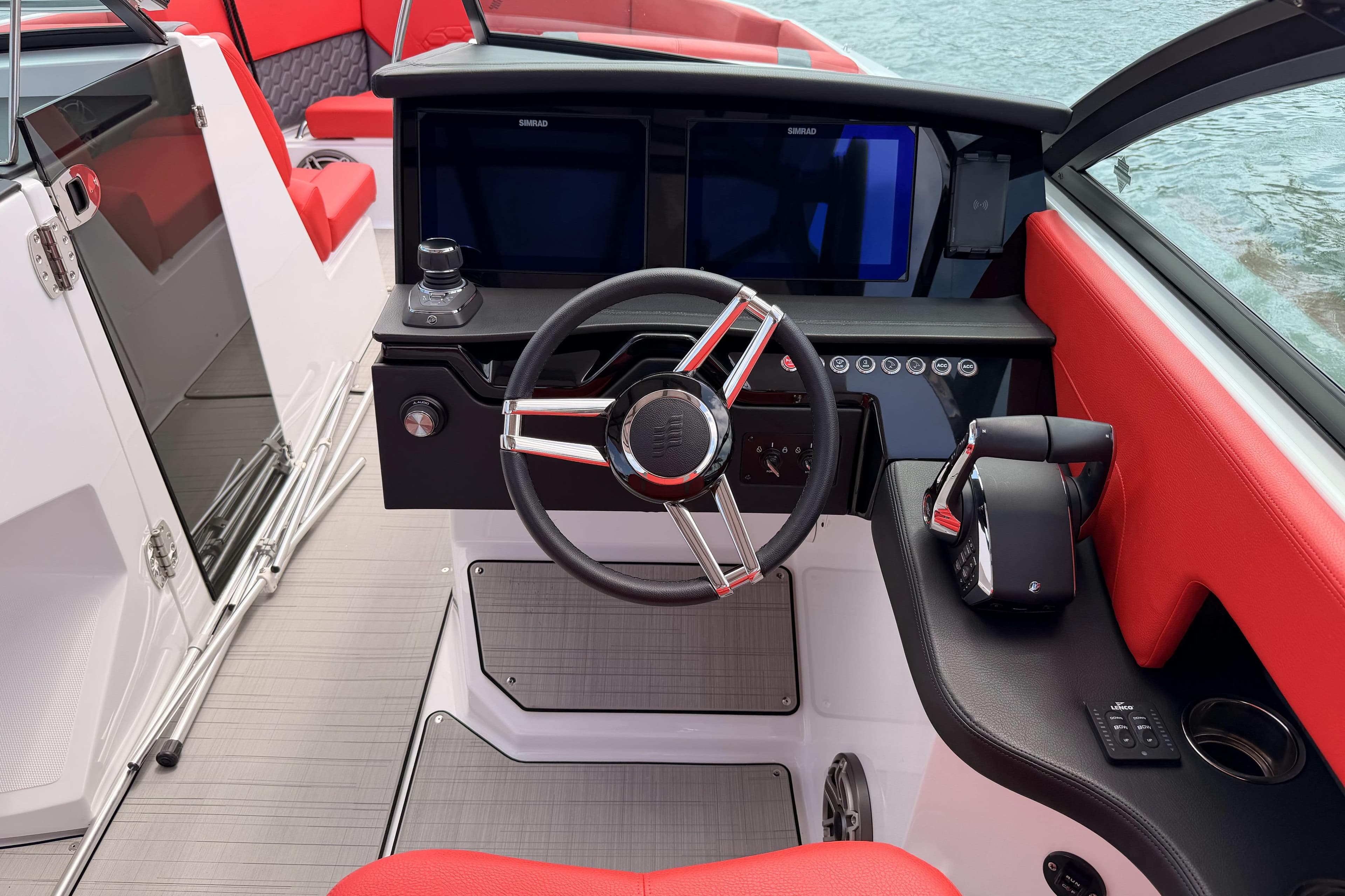 2025 Four Winns H9 OB boat cockpit with modern steering and controls.