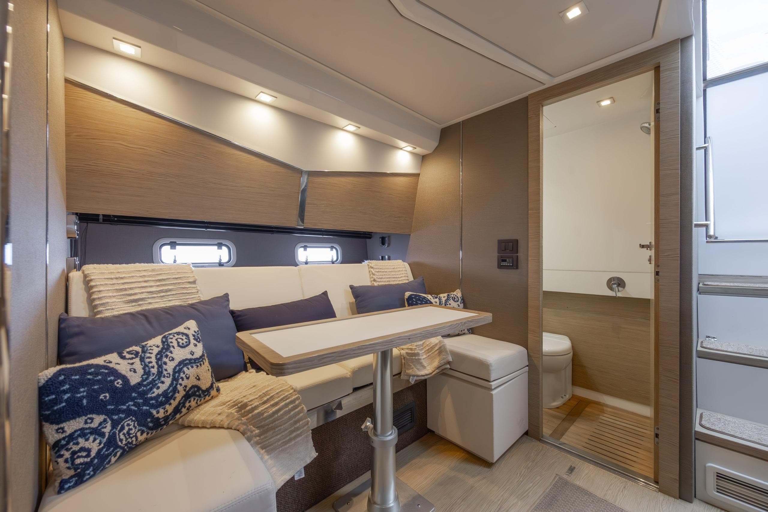 Luxurious interior of 2019 Azimut Verve 40 yacht with elegant seating and modern decor.