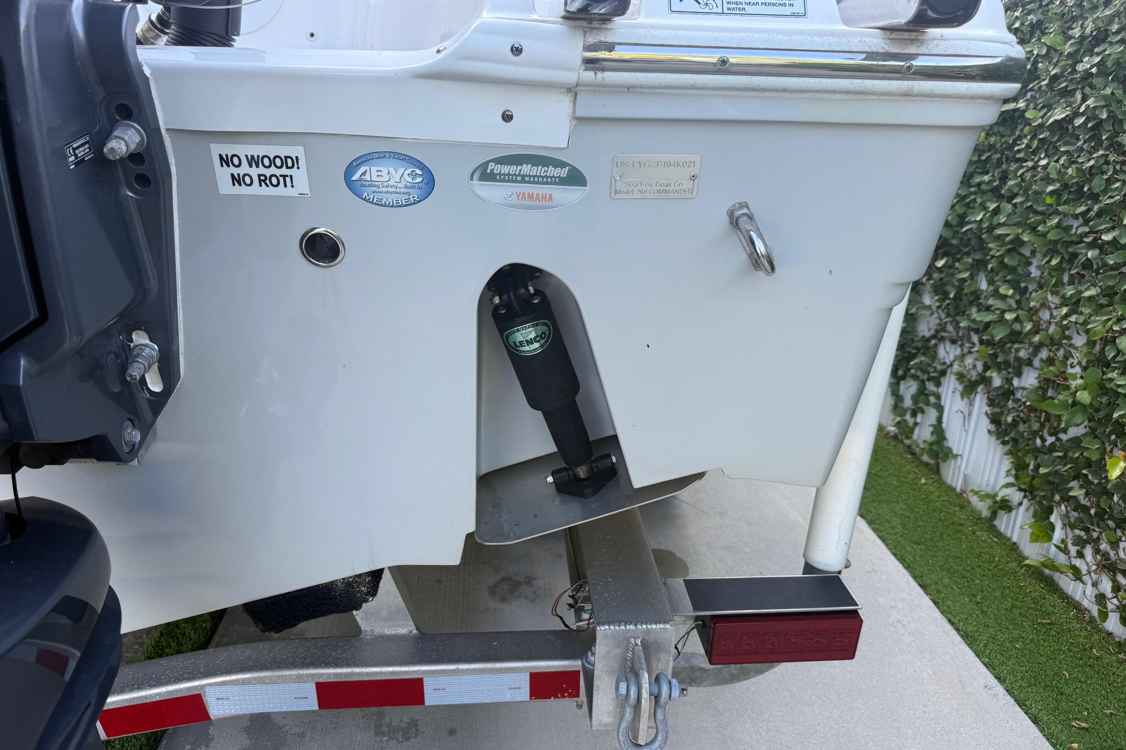 Rear view of a 2021 Sea Fox 268 Commander boat on a trailer.
