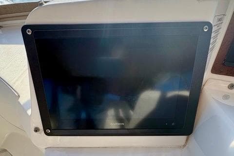 Garmin navigation display on 2008 Silverton 36 Convertible boat dashboard.