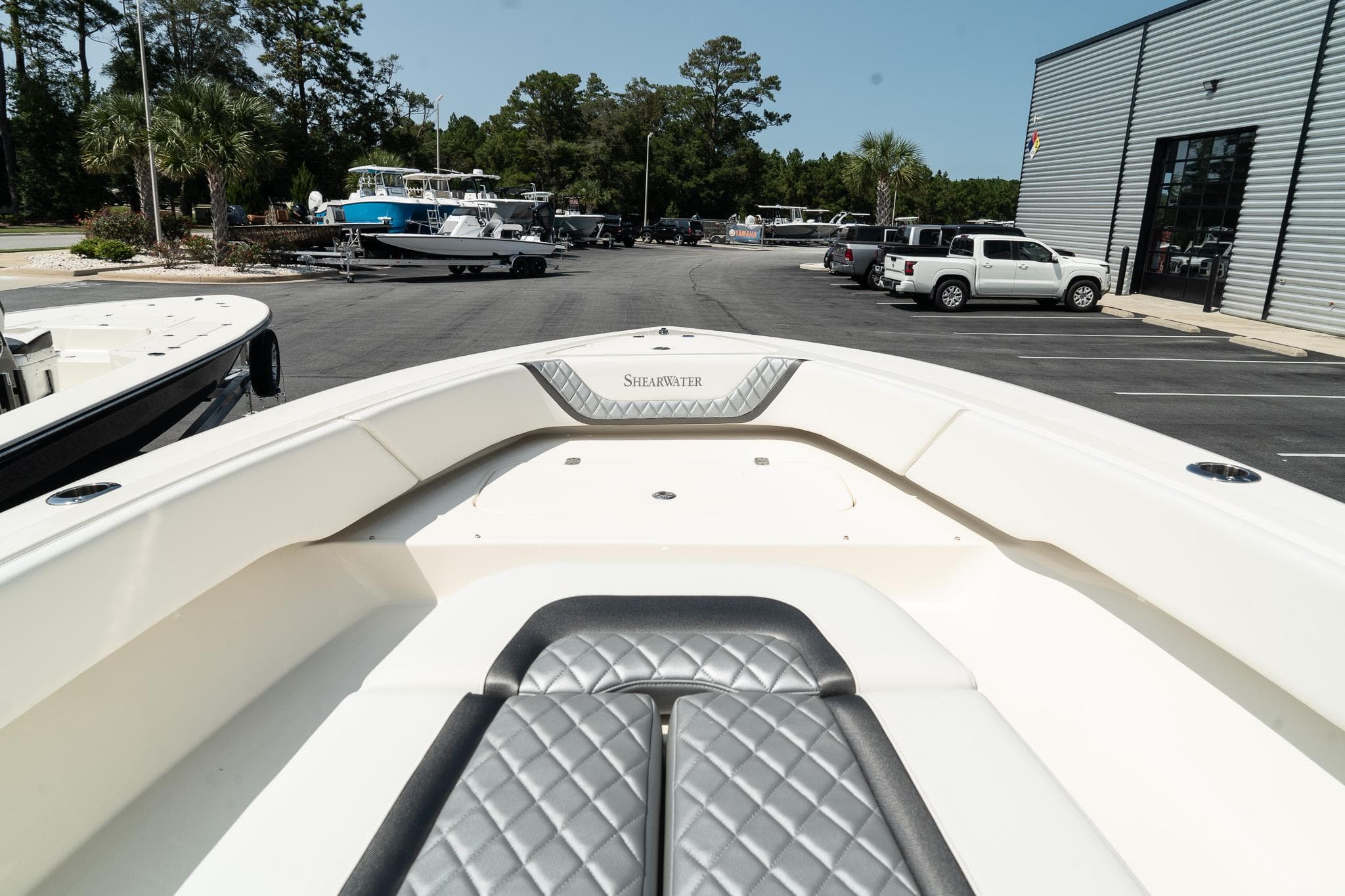 2025 ShearWater 27 Carolina Open boat, docked with sleek design and spacious deck.
