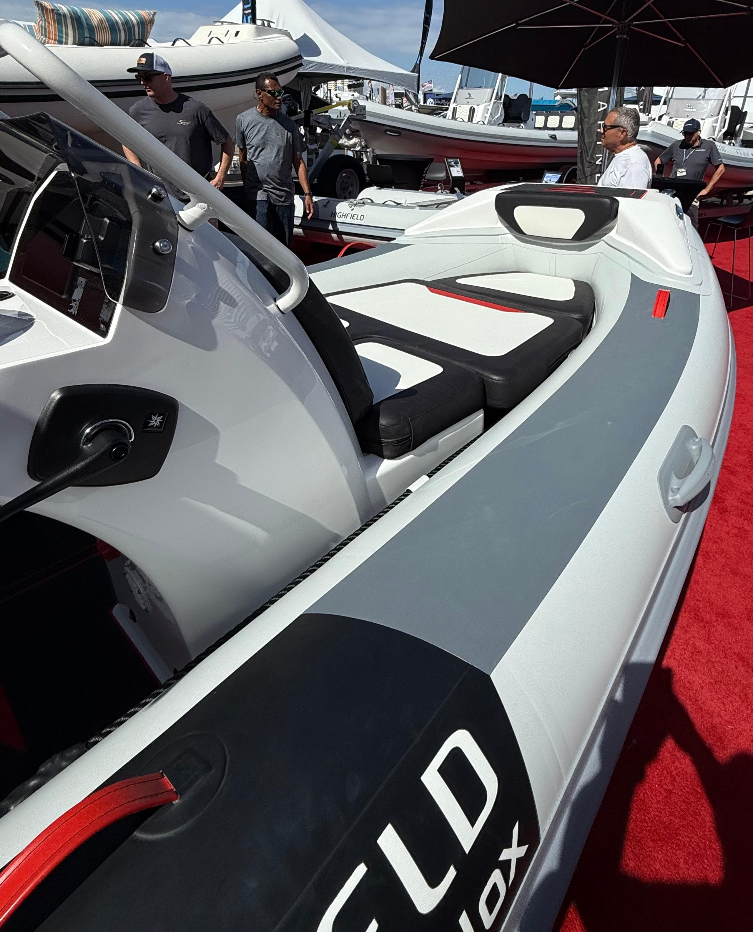 2025 Highfield Velox 420 boat displayed at a marine exhibition.