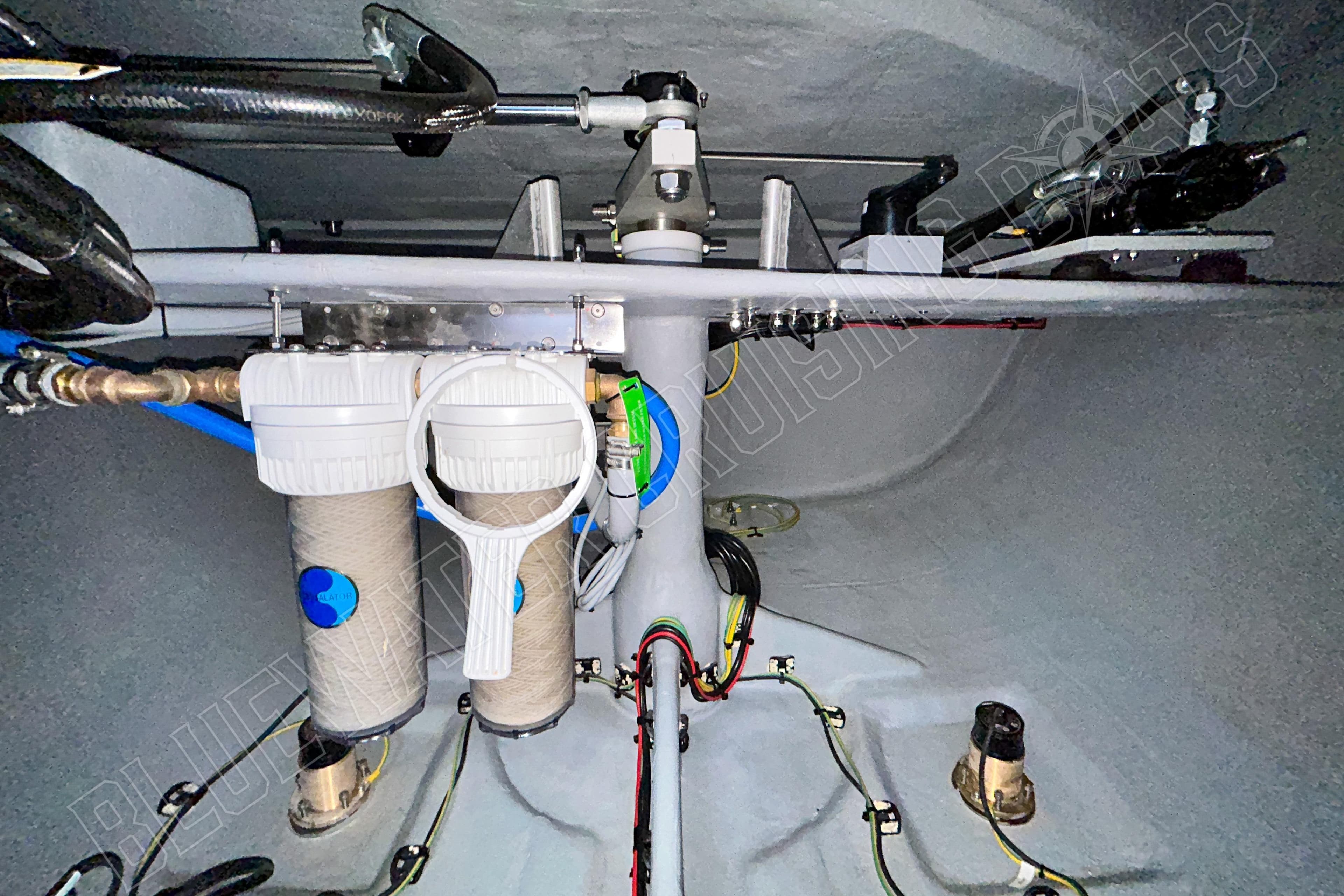 Interior view of 2025 Privilege 580 yacht's technical compartment with water filtration system.