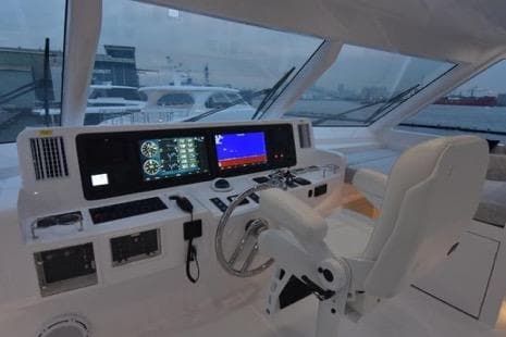 Modern yacht cockpit with advanced navigation systems, Horizon PC65, 2022 model.