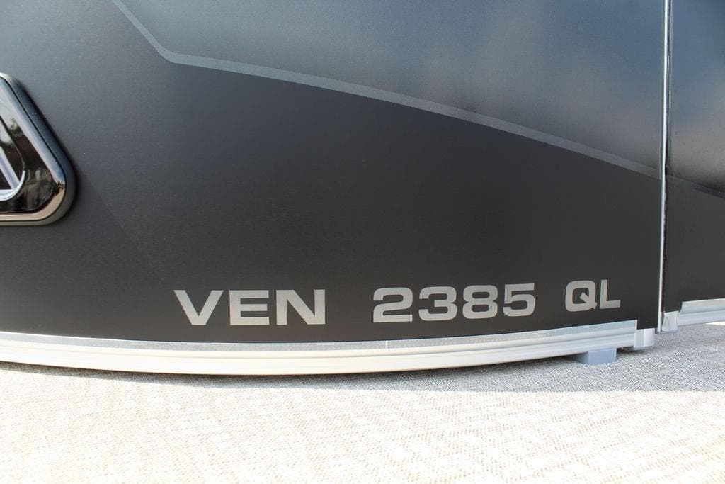 Close-up of Avalon Venture 85 Quad Lounger 2026 model, featuring "VEN 2385 QL" text.