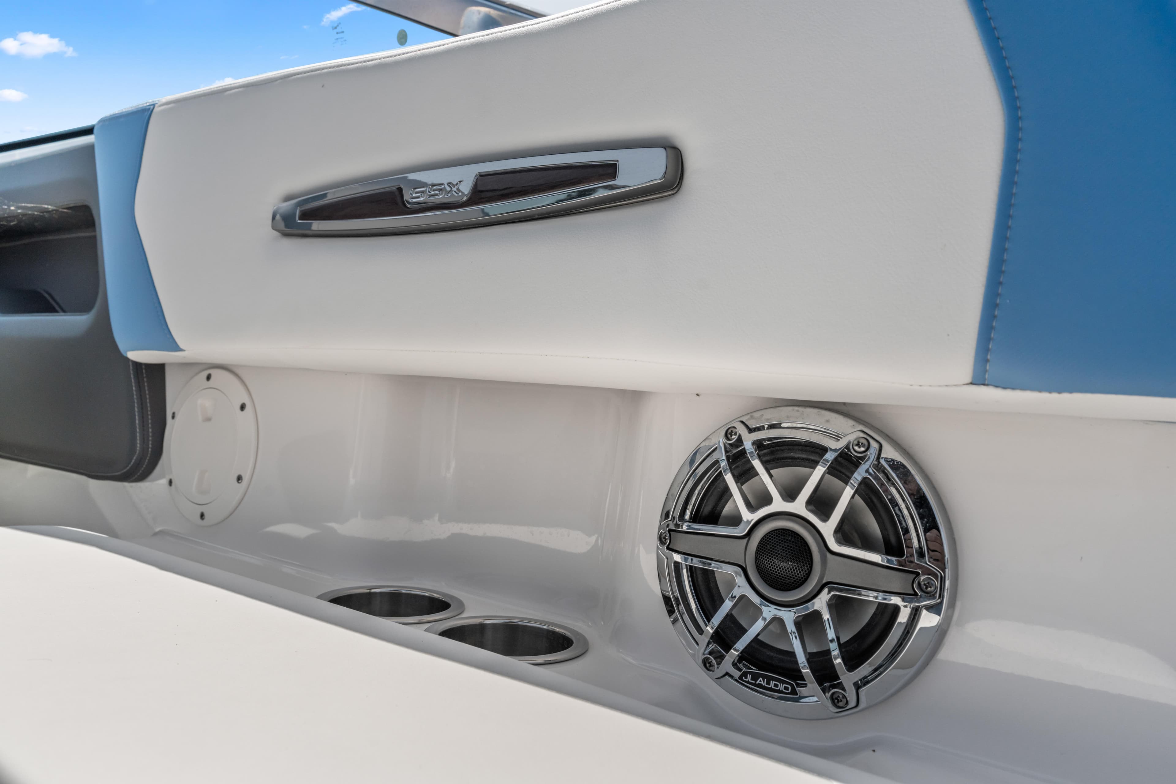 2022 Chaparral 247 SSX boat interior with JL Audio speaker and cup holders.