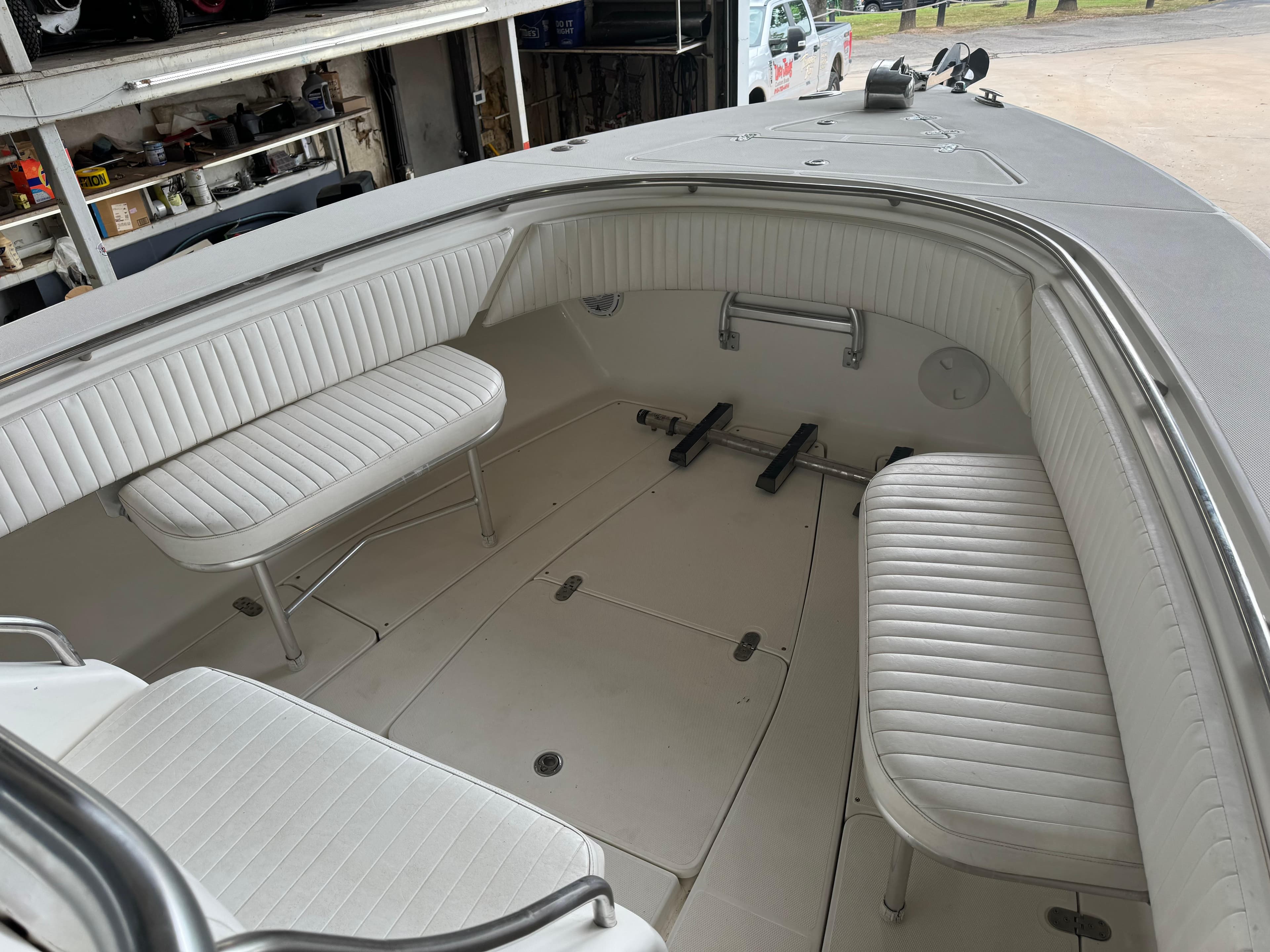 2007 Fountain 32 CC boat interior with white seating and spacious deck area.
